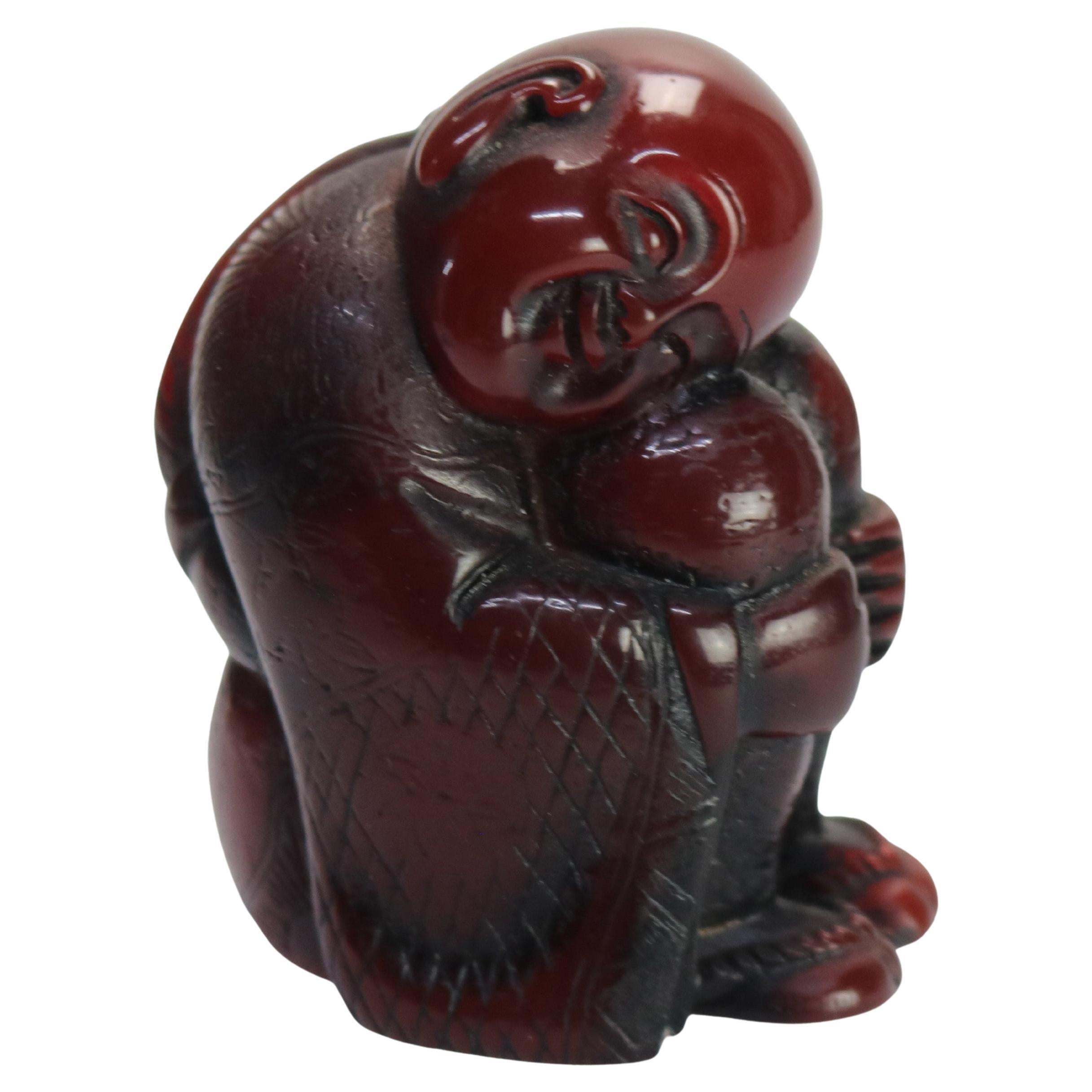 Antiguo Netsuke de ámbar tallado Figura de Buda C1900