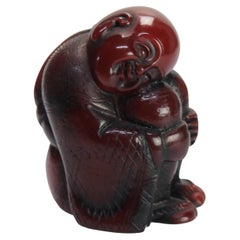 Antiguo Netsuke de ámbar tallado Figura de Buda C1900