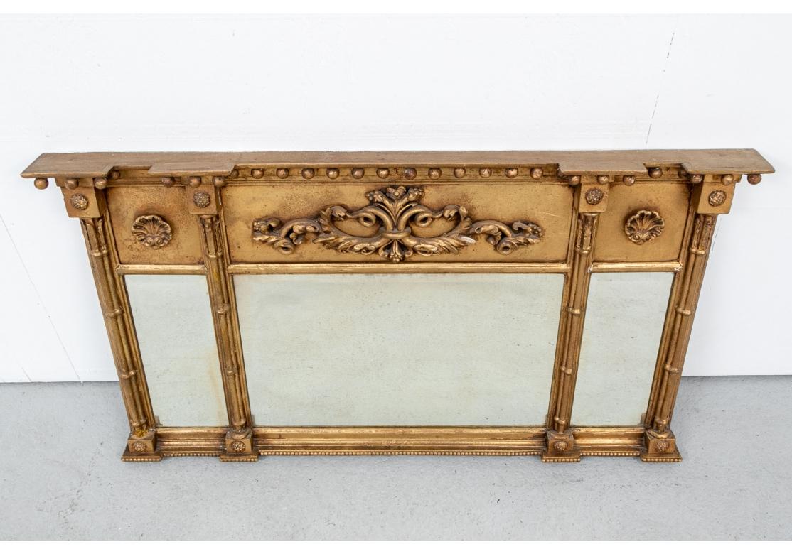 Neoclassical Antique Carved And Gilt Three Part Over-The-Mantel Mirror For Sale