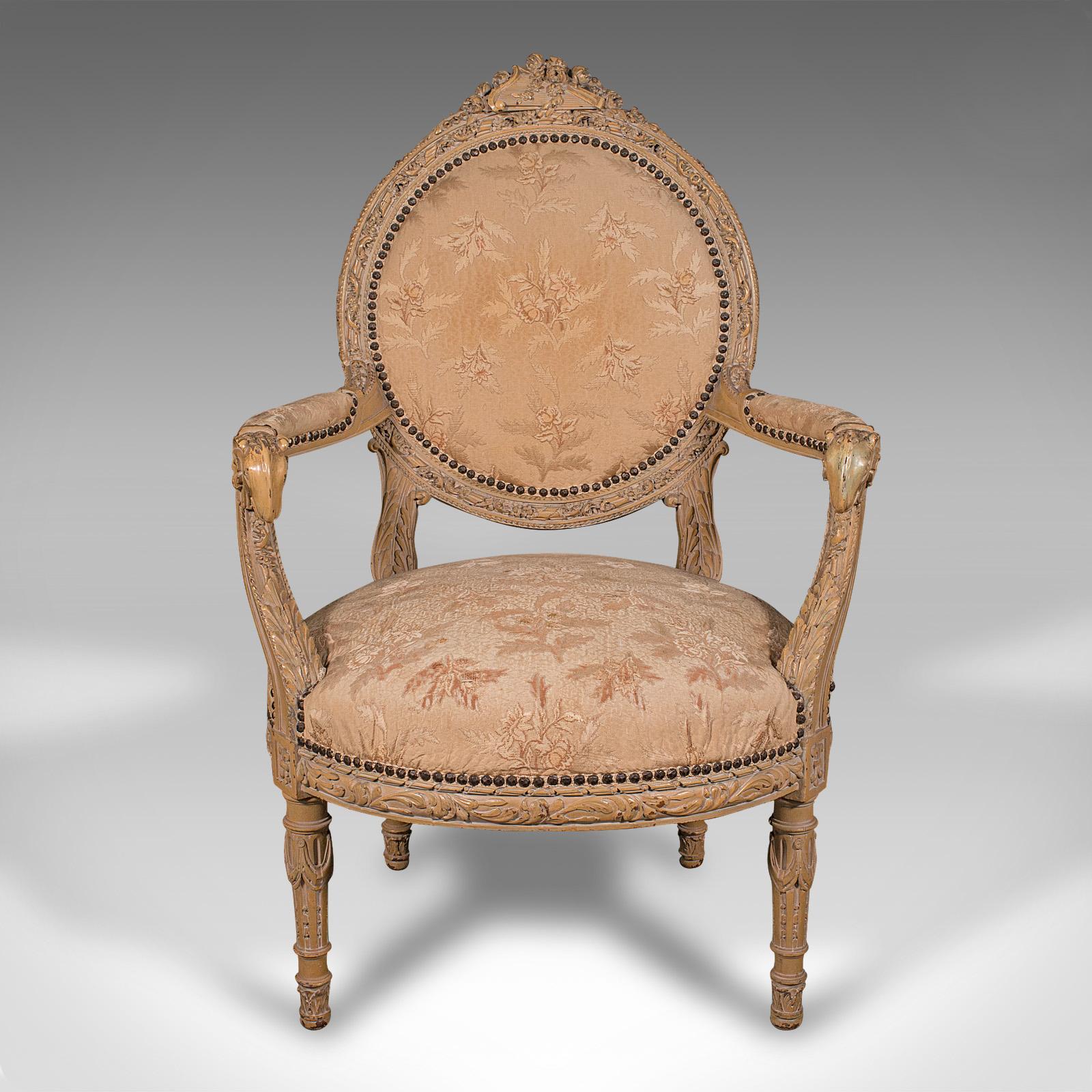 This is an antique carved armchair. A French, painted mahogany fauteuil chair, dating to the late Victorian period, circa 1870.

Classic example of a fauteuil chair, with an open frame and upholstered arms
Displays a desirable aged patina and in