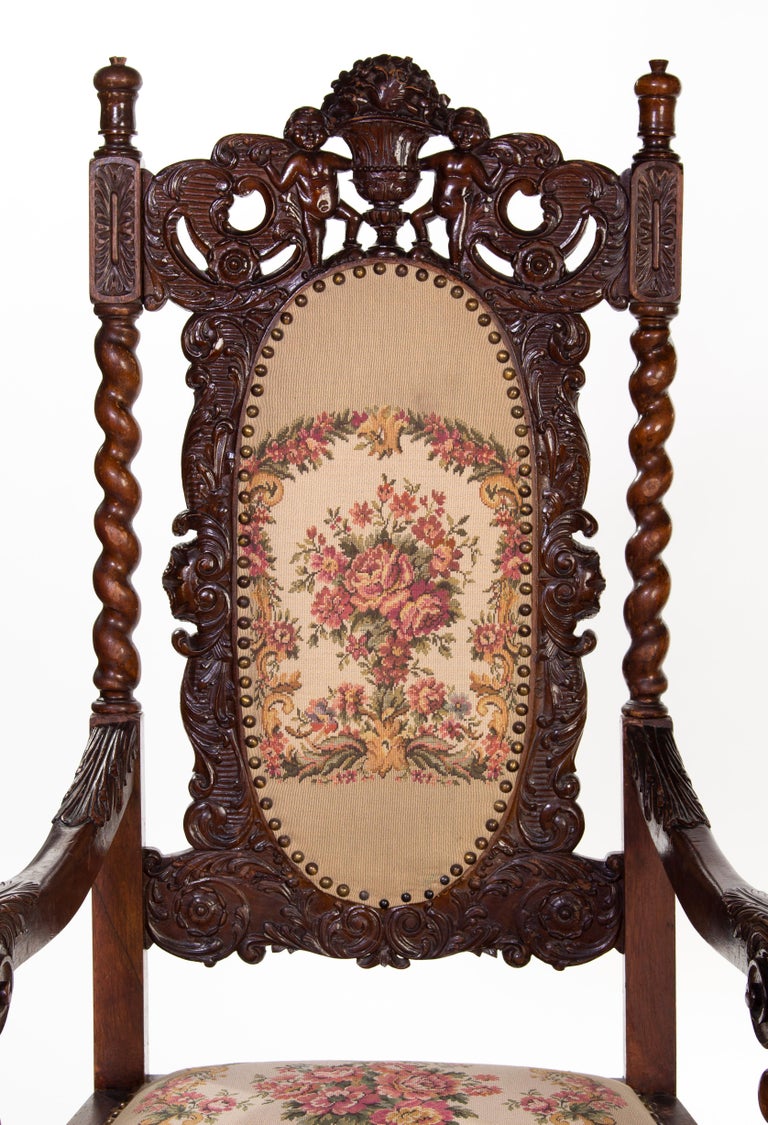 Antique basswood throne chairs in pair in renaissance revival style,
with fine carved details and embroidered upholstery.
Manufactured arround 1900.