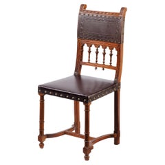 Antique Carved Chair with Original Stamped Leather Back: The Lost Spindle
