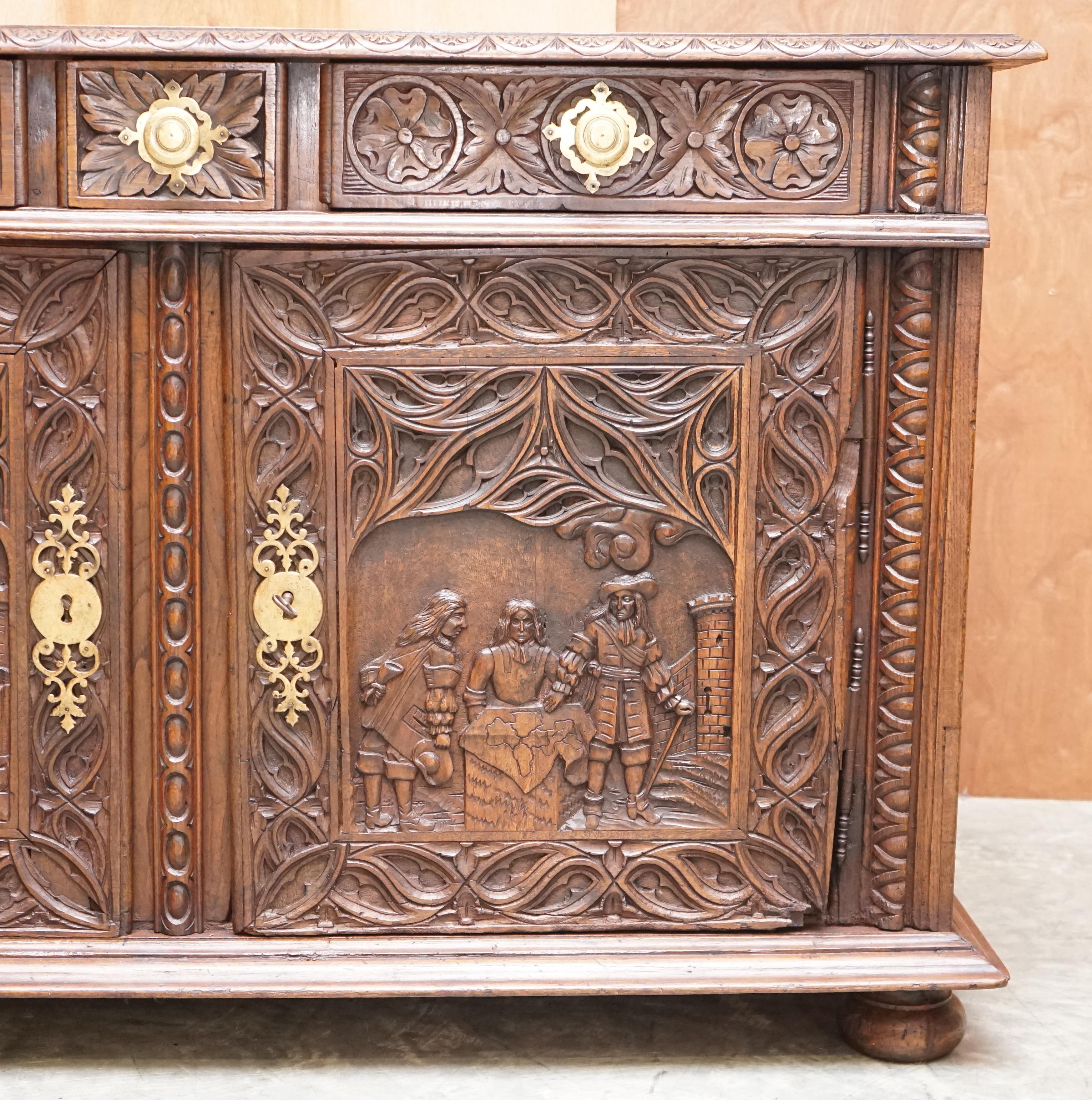 Hand-Carved Antique Carved Circa 1800 Continental Oak Sideboard Beautiful Military Panels For Sale