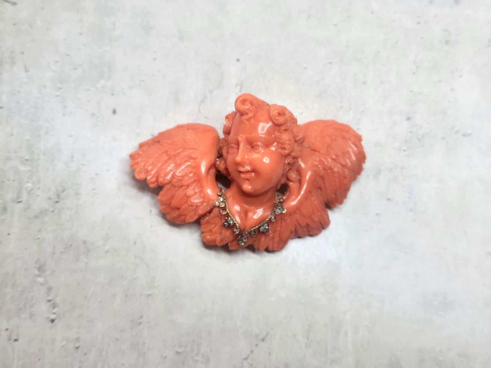 Renaissance Antique Carved Coral Sciacca, Gold, and Diamond Cherub Brooch For Sale