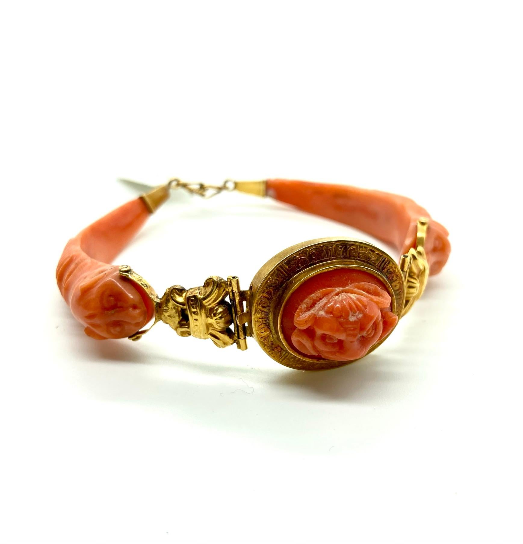 A beautiful carved coral and yellow gold bracelet from the 19th century. Made in Italy.