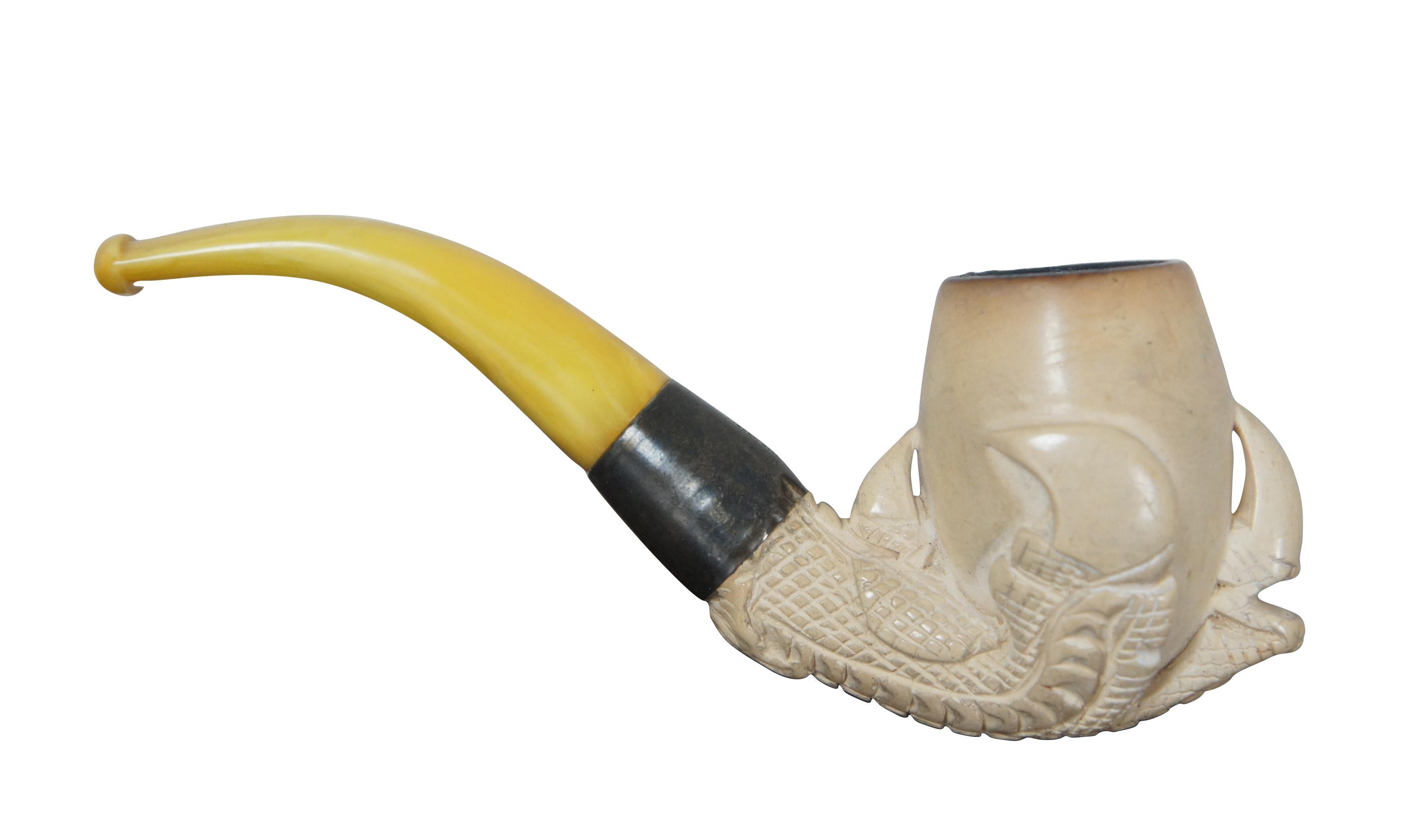 Antique meerschaum pipe with Bakelite and sterling handle. Features a dragon or eagle claw holding an egg. 

Measures: Pipe - 5” x 2” x 1.5” / Case - 5.5” x 2.5” x 2” (length x width x depth).