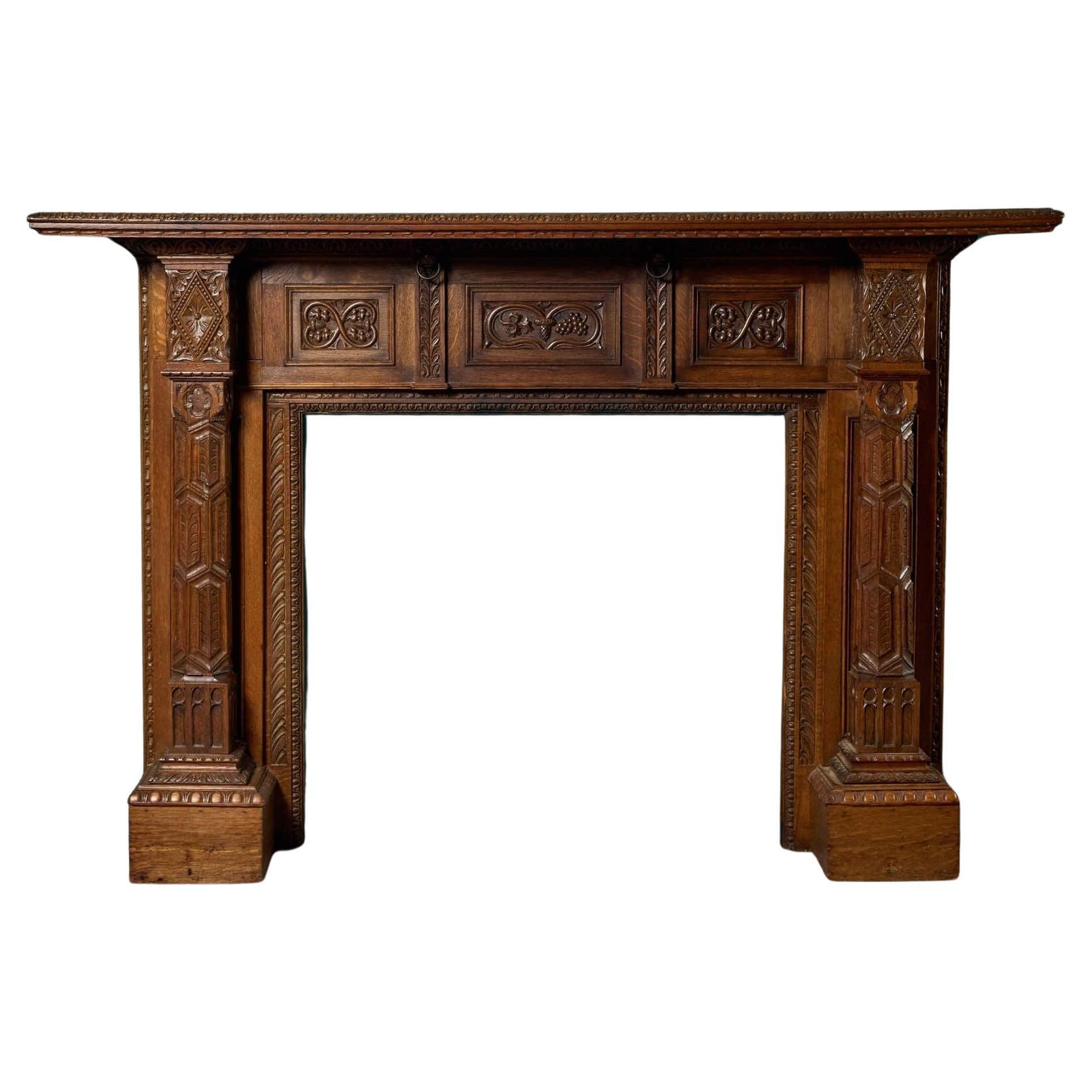 Antique Carved English Oak Fireplace For Sale