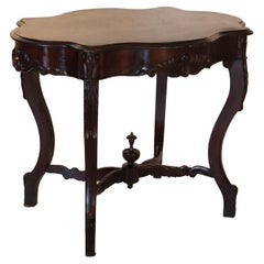 Antique Carved Flame Mahogany Turtle Top Table C1880