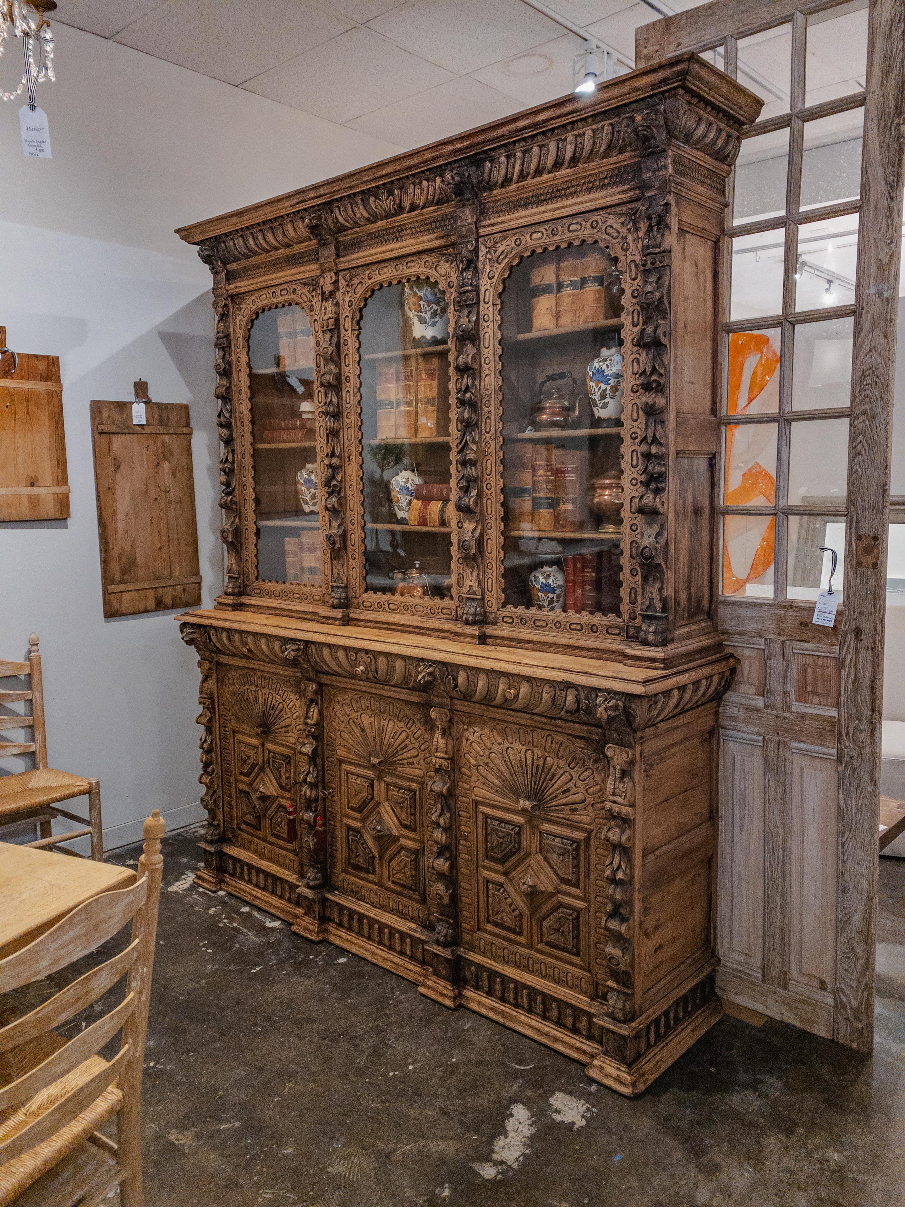 The Antique Carved French Hunt Cabinet is a traditional furniture piece originating from France. It is known for its exquisite craftsmanship and intricate carvings. The cabinet features a sturdy wooden construction with detailed hunting-themed