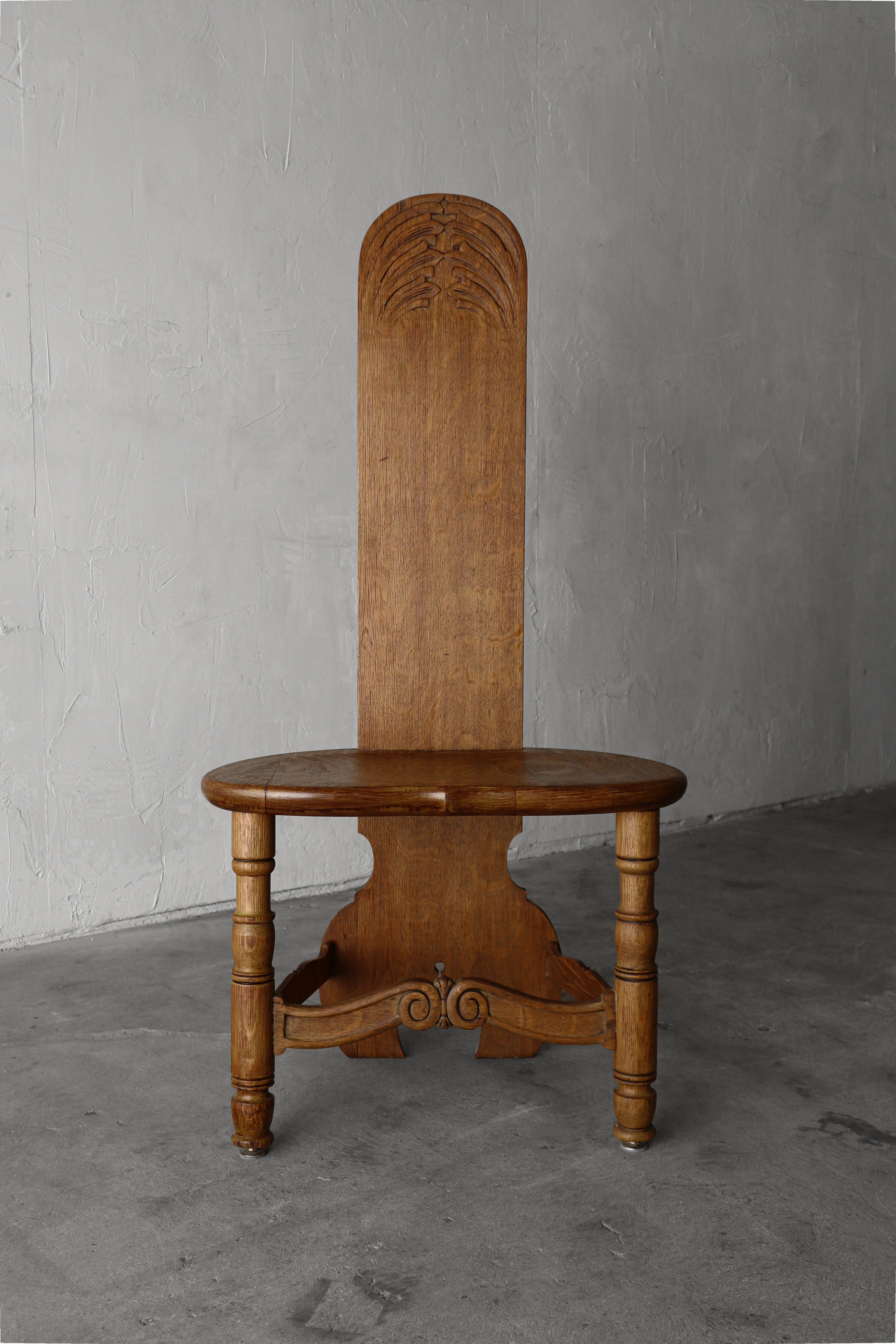 Incredible example of antique carved oak.  This chair is truly unique the details are everything.  The arched back, the carved and cut-out details.

If you are looking for the perfect one off chair for that special spot, look no further.  This chair