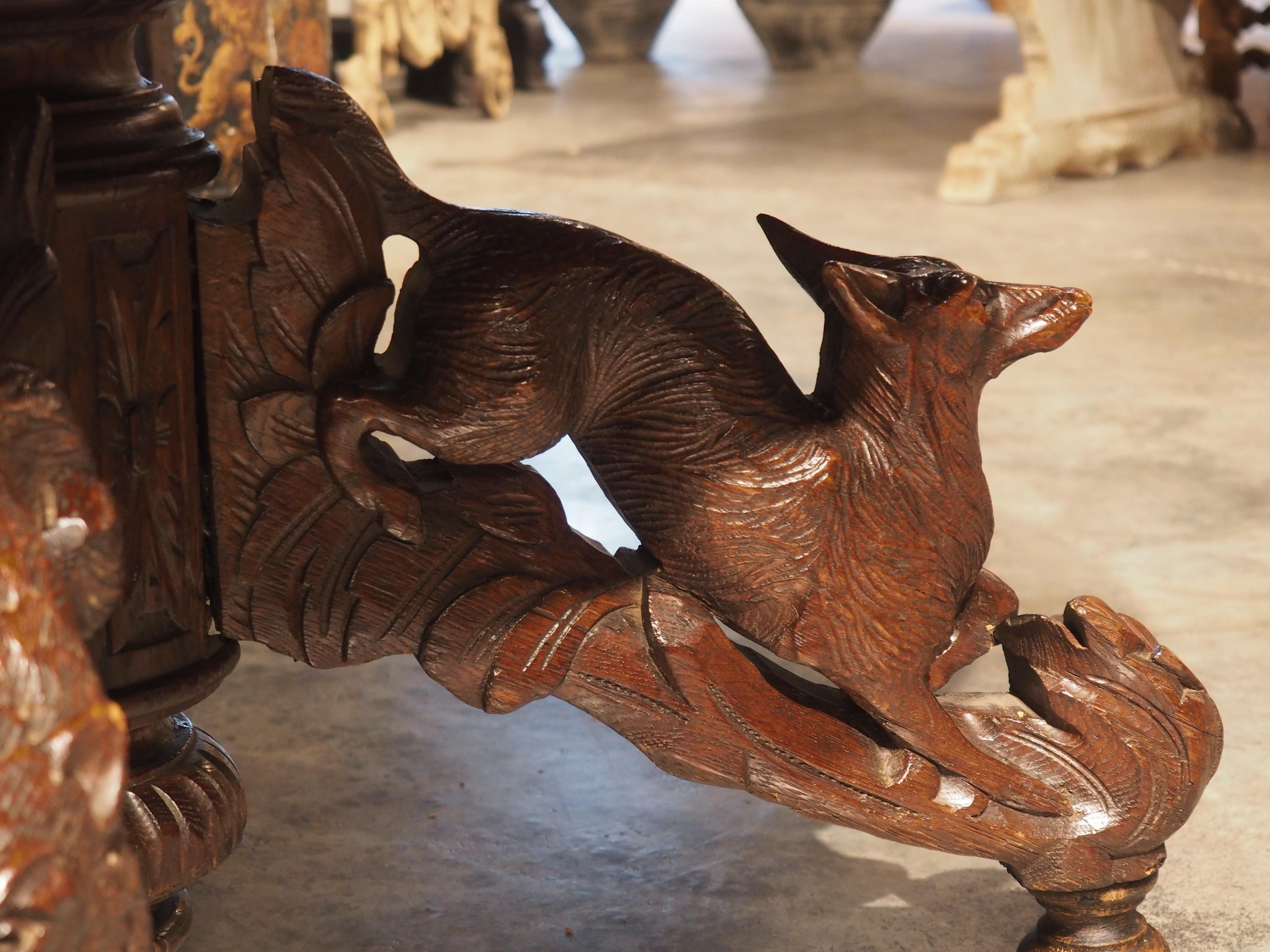 Antique Carved French Oak Oval Hunt Table with Boar, Dog, Fox, and Stag, c 1890 In Good Condition For Sale In Dallas, TX