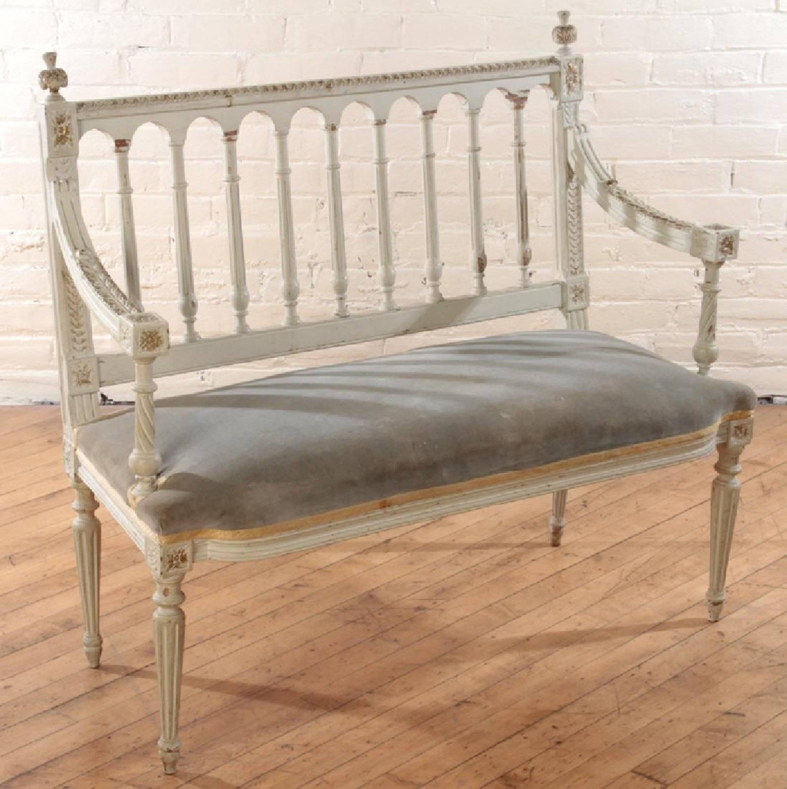 Antique carved French painted settee, circa 1910.