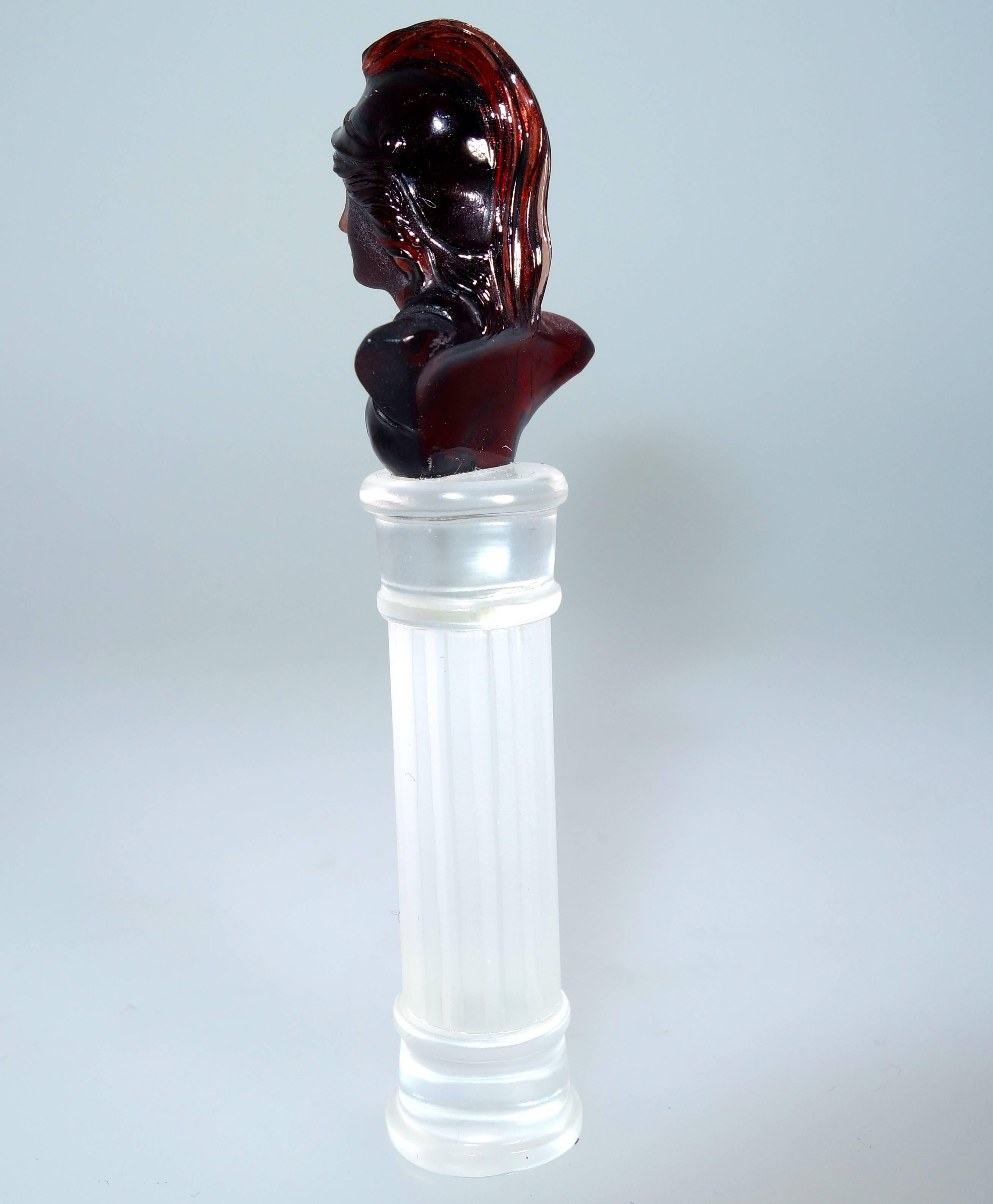Unusual and finely carved in round natural garnet bust on a rock crystal base.  Accompanied by A.G.L.  certificates stating natural garnet and rock crystal stones, this object is well done obviously by a master in the early 19th century.  This