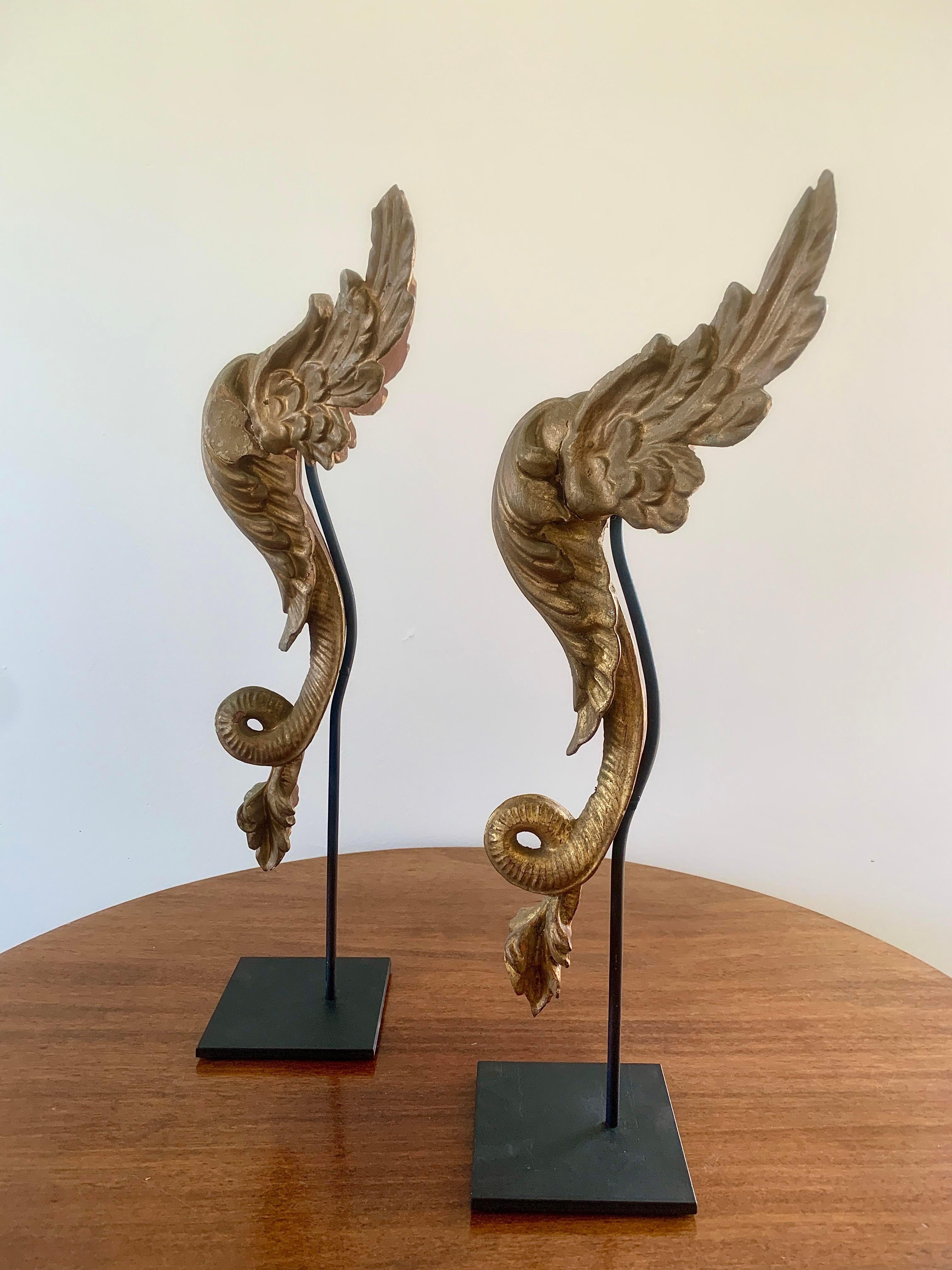 Italian Antique Carved Giltwood Architectural Winged Fragments with Serpent Tails, circa For Sale