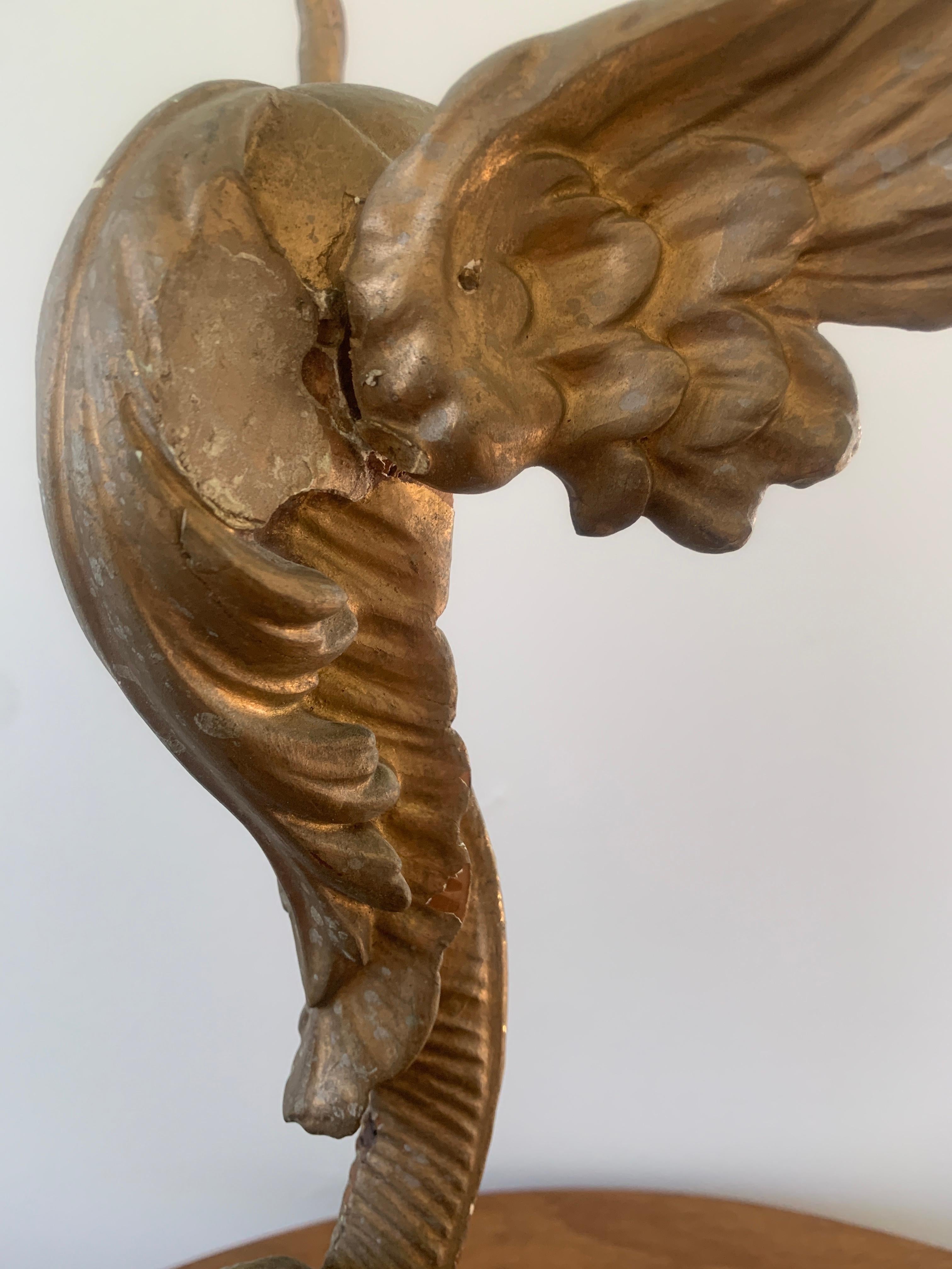 Steel Antique Carved Giltwood Architectural Winged Fragments with Serpent Tails, circa