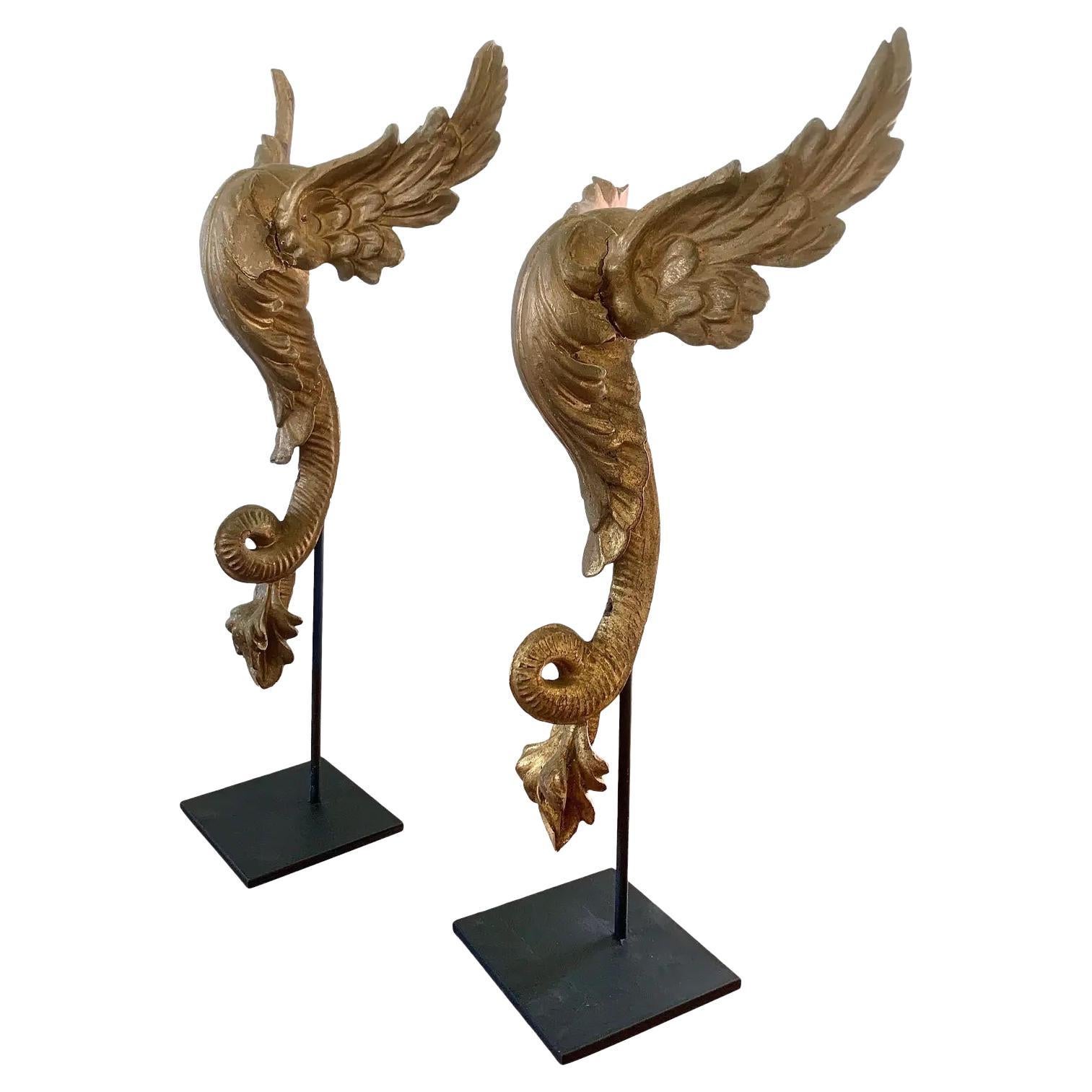 Antique Carved Giltwood Architectural Winged Fragments with Serpent Tails, circa For Sale