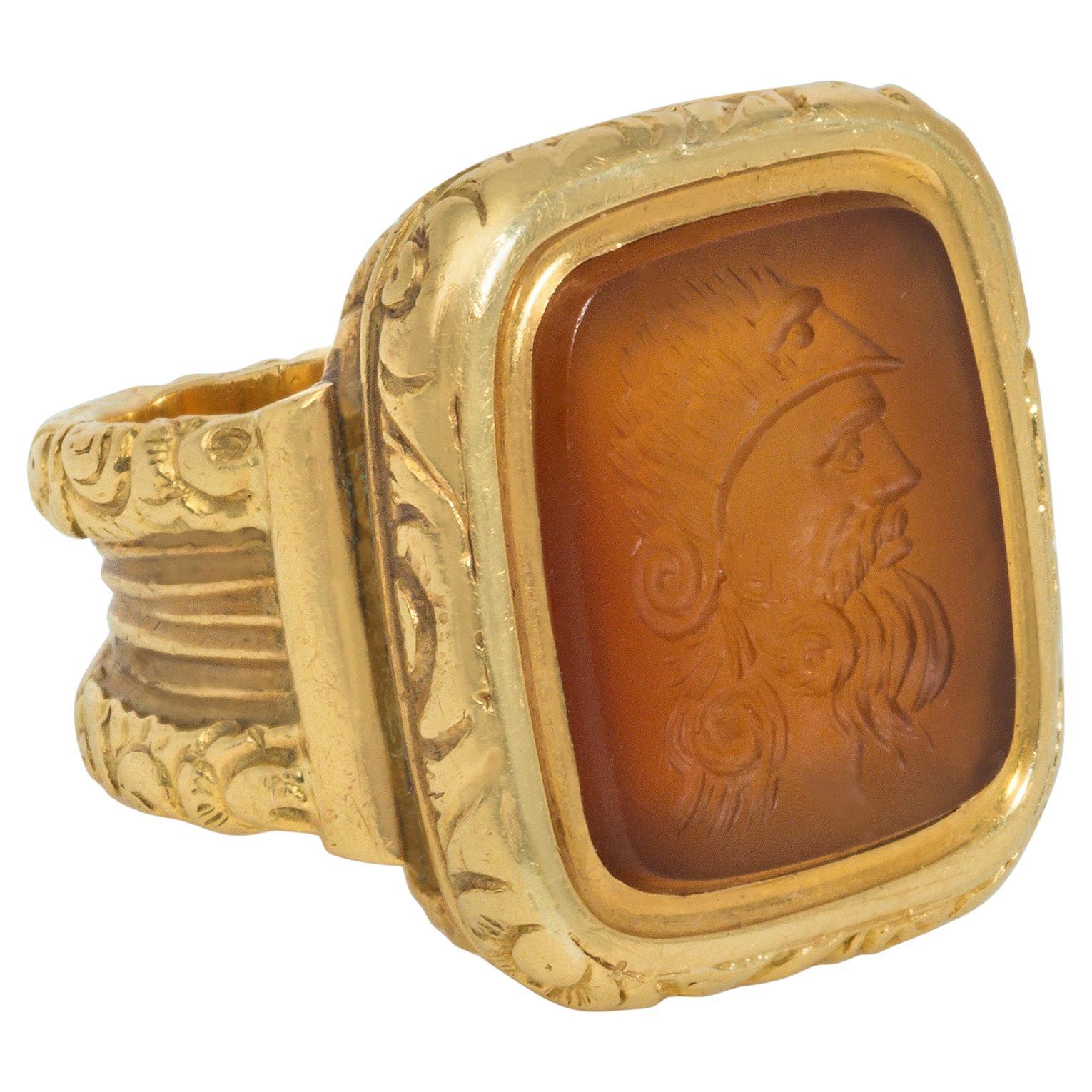 Antique Carved Gold and Carnelian Intaglio Ring Featuring an Ancient Warrior