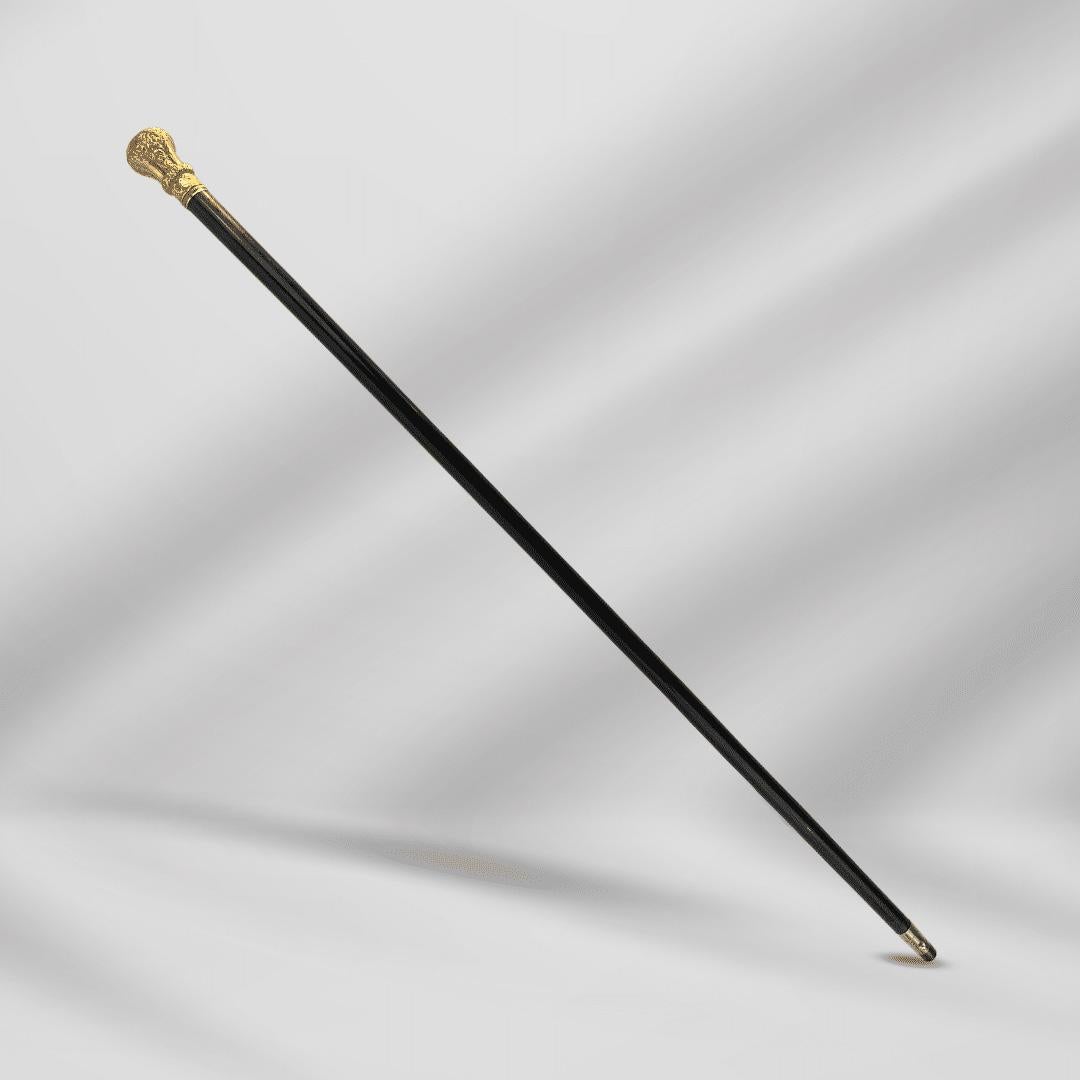 Antiker geschnitzter, goldfarbener, gefüllter Knopfgriff, Gehstock, Schilfrohr, schwarz

Dieser klassisch elegante Artikel ist ein perfektes Beispiel für die Verschmelzung von Funktionalität und dramatischem Flair. Die exquisite Handwerkskunst zeigt