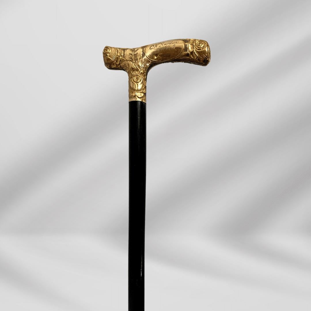 Antique Carved Gold Plate Knob Handle Skinner Walking Stick Cane Black Signed In Good Condition For Sale In Jacksonville, FL