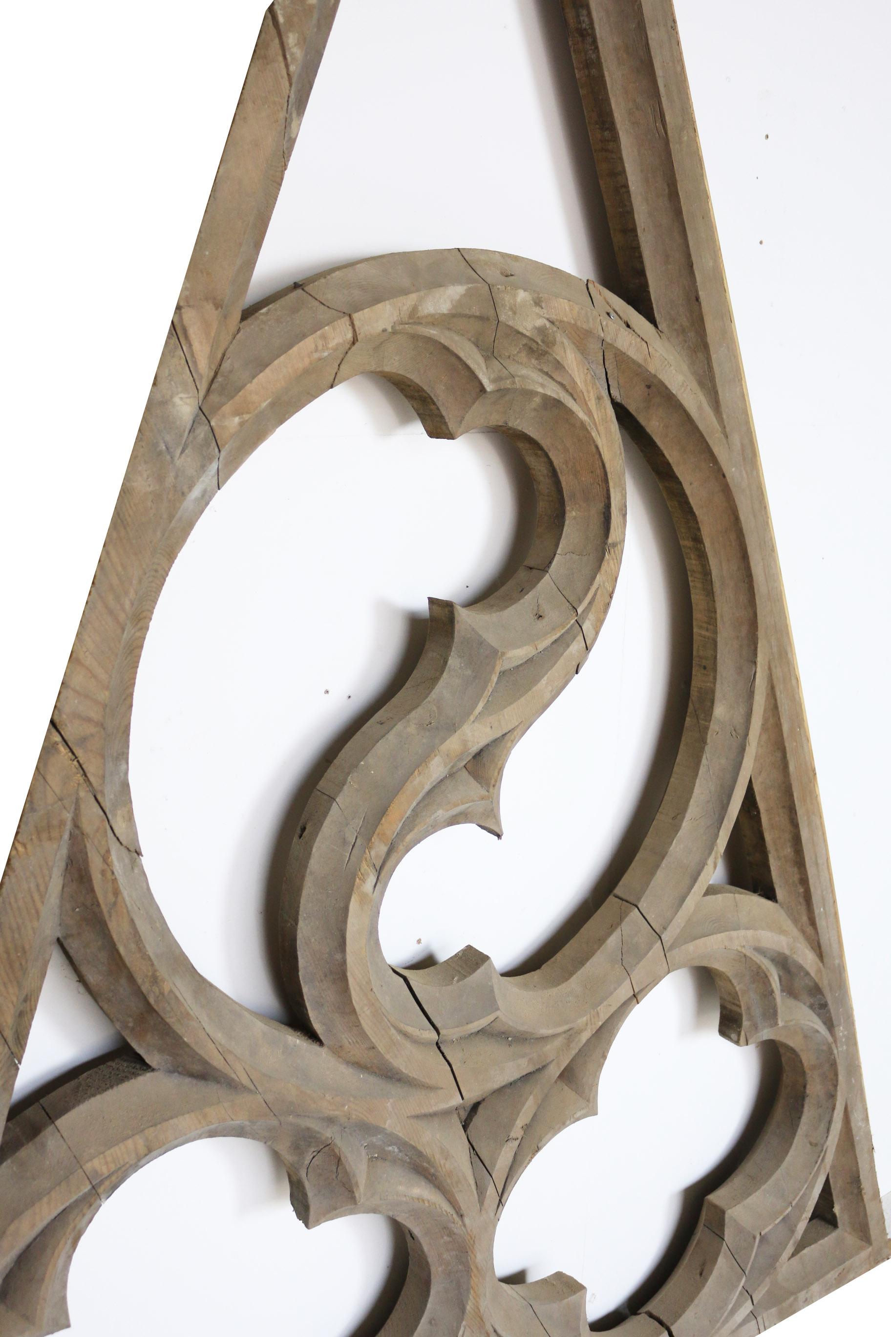 Hand carved pine Tracery with temporary pine frames (frame not seen in images) in good condition for its age however comes in pieces and has some knocks and abrasions with some losses.

Measurements are excluding temp frames. 

We have 3