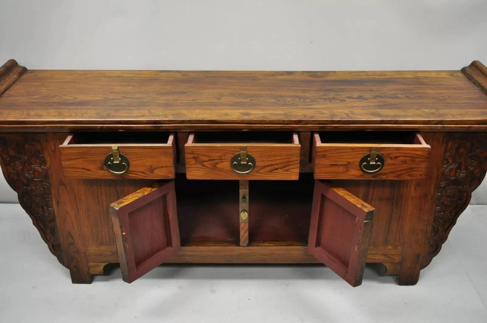 Antique Carved Hardwood Chinese Altar Console Table Sideboard Buffet Credenza. Item features a custom glass top, solid wood construction, beautiful wood grain, nicely carved details, 2 swing doors, 3 drawers, quality craftsmanship. Circa Mid 20th