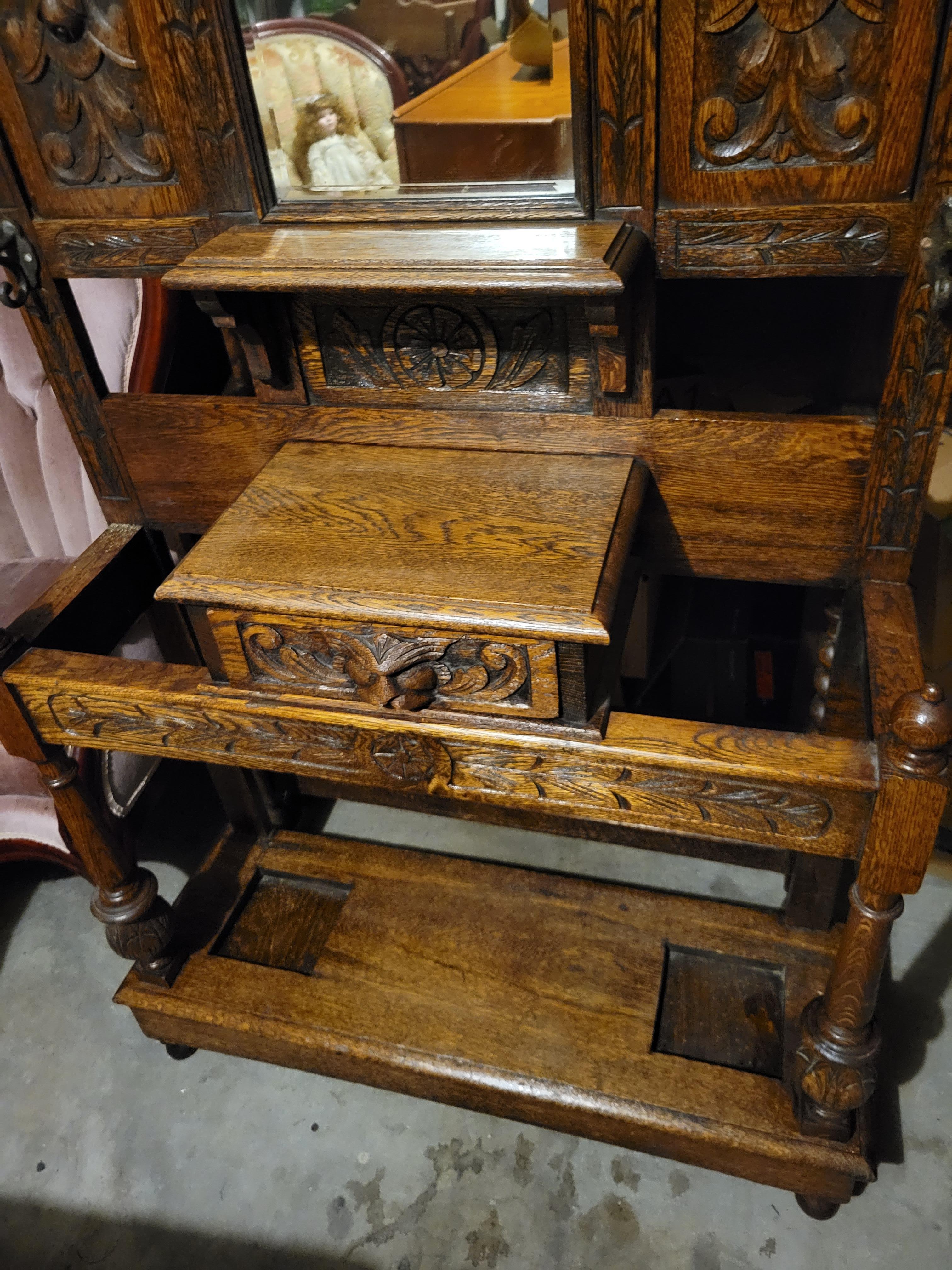 antique hall tree with bench