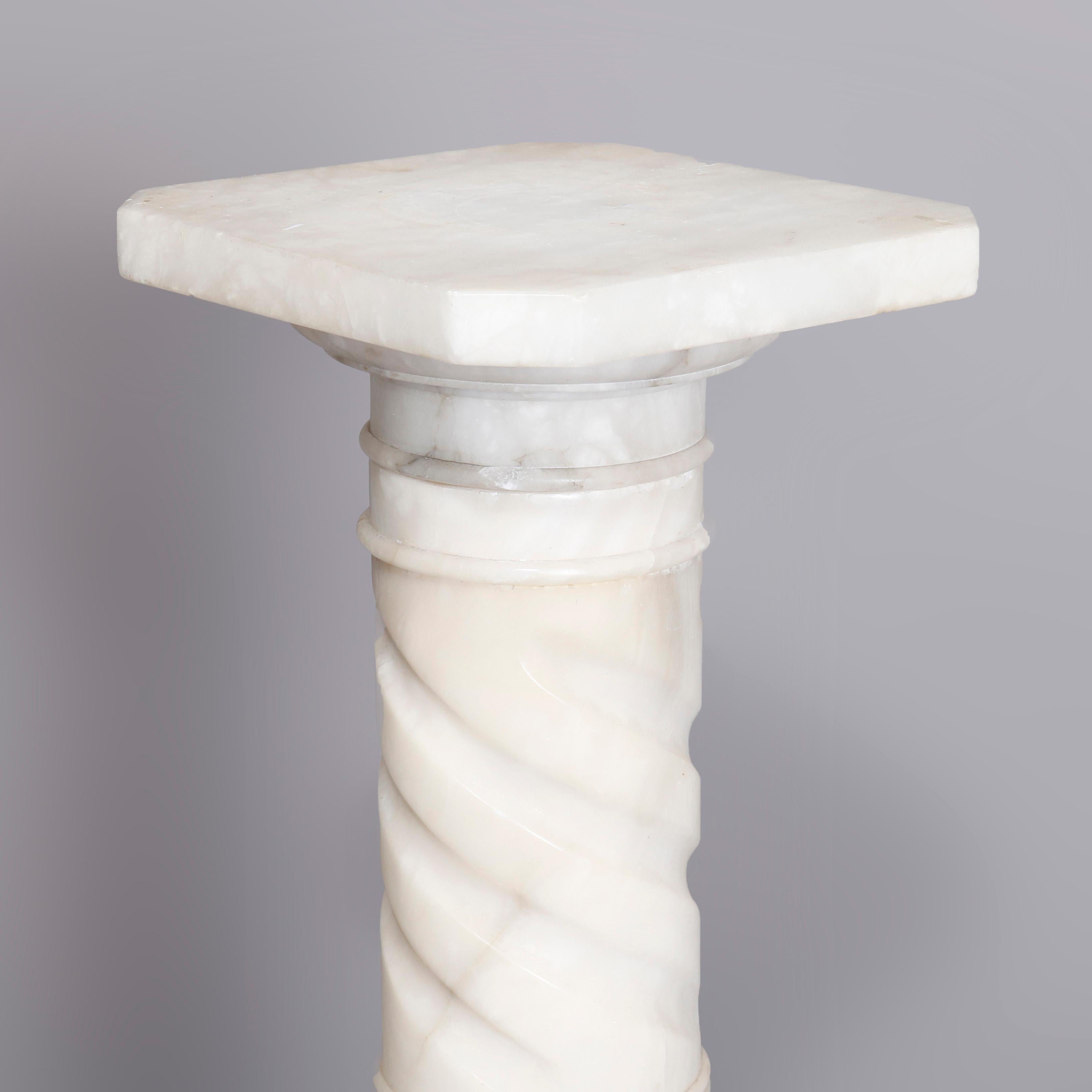 An antique carved Italian marble sculpture display pedestal offers Doric column form with clipped corner display surmounting twisted rope form column seated on stepped base, circa 1900.

***DELIVERY NOTICE – Due to COVID-19 we are employing