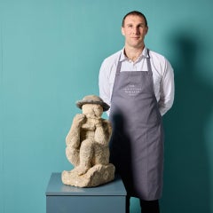 Antique Carved Limestone Statue of a Boy Playing Pipes