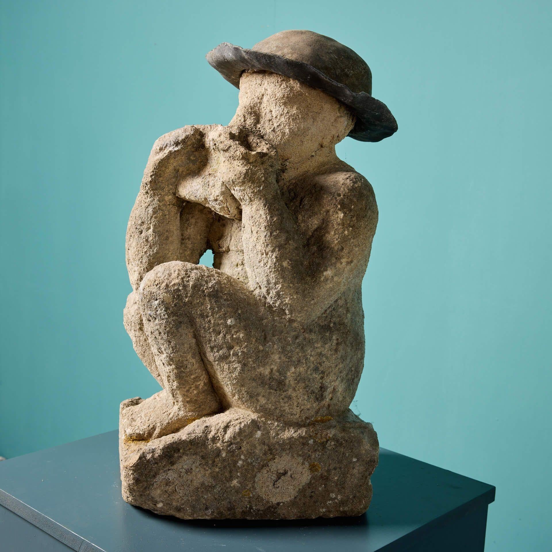 Hand-Carved Antique Carved Limestone Statue of a Boy Playing Pipes For Sale