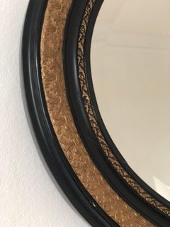 Antique Carved Louis Philippe Oval Mirror In Black and Gold France Late 19th Cen