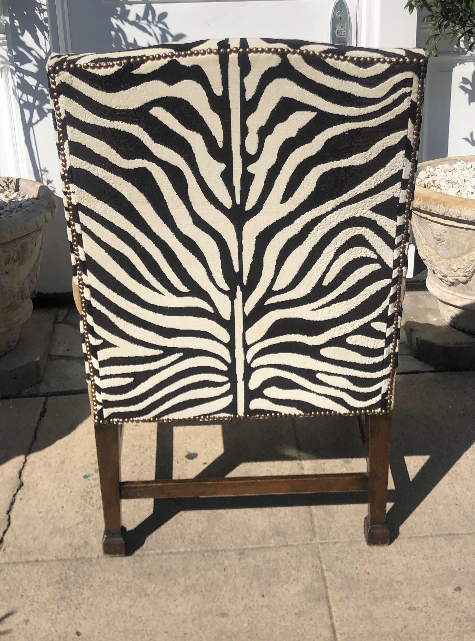 Imposing antique carved mahogany desk or side chair newly covered in Clarence House zebra velvet and mohair.