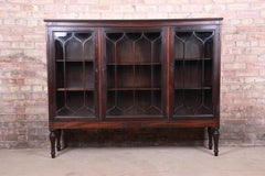 Antique Carved Mahogany Glass Front Triple Bookcase, circa 1920s