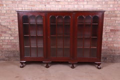 Antique Carved Mahogany Triple Bookcase with Ball and Claw Feet, Circa 1920s