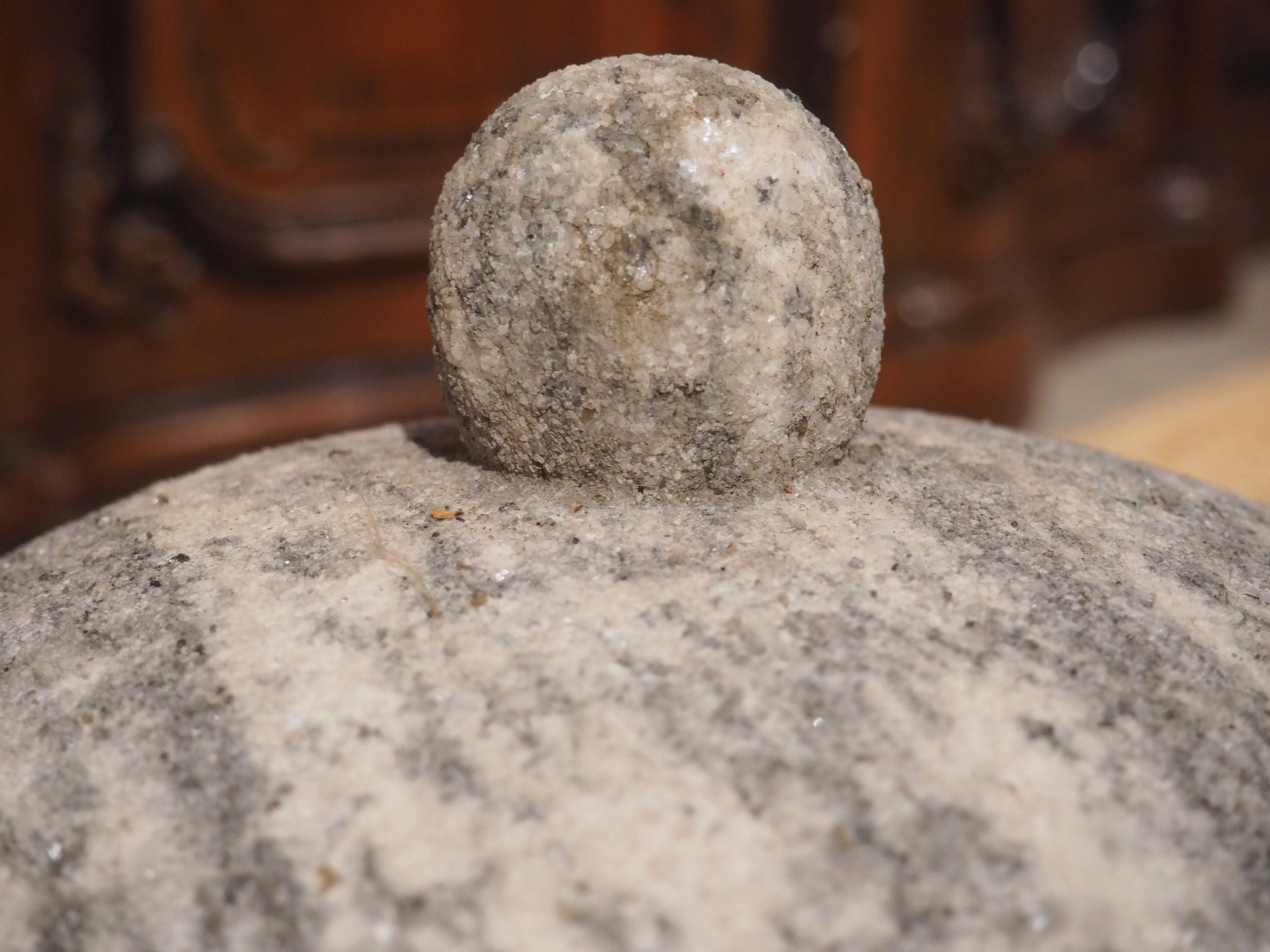 This marble crown finial was hand-carved in Italy in the 1800’s. The marble is cream colored with fascinating gray striped veining. Years of patina build up has also added a darker gray hue in some spots, specifically around the base.

The marble
