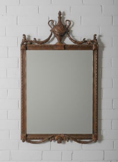 Antique Carved Mirror with Classical Urn Crest and Applied Metal Ornamentation