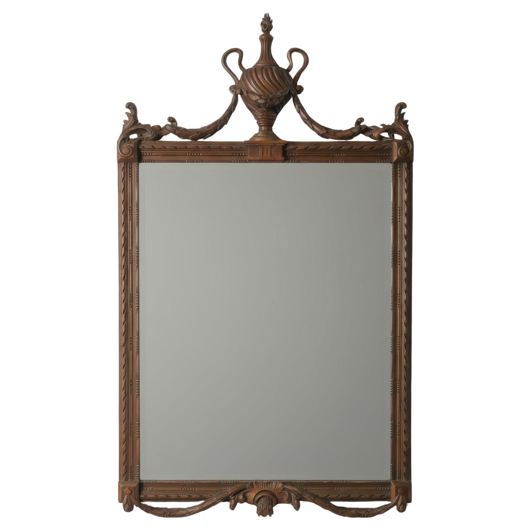 Antique Carved Mirror with Classical Urn Crest and Applied Metal Ornamentation For Sale