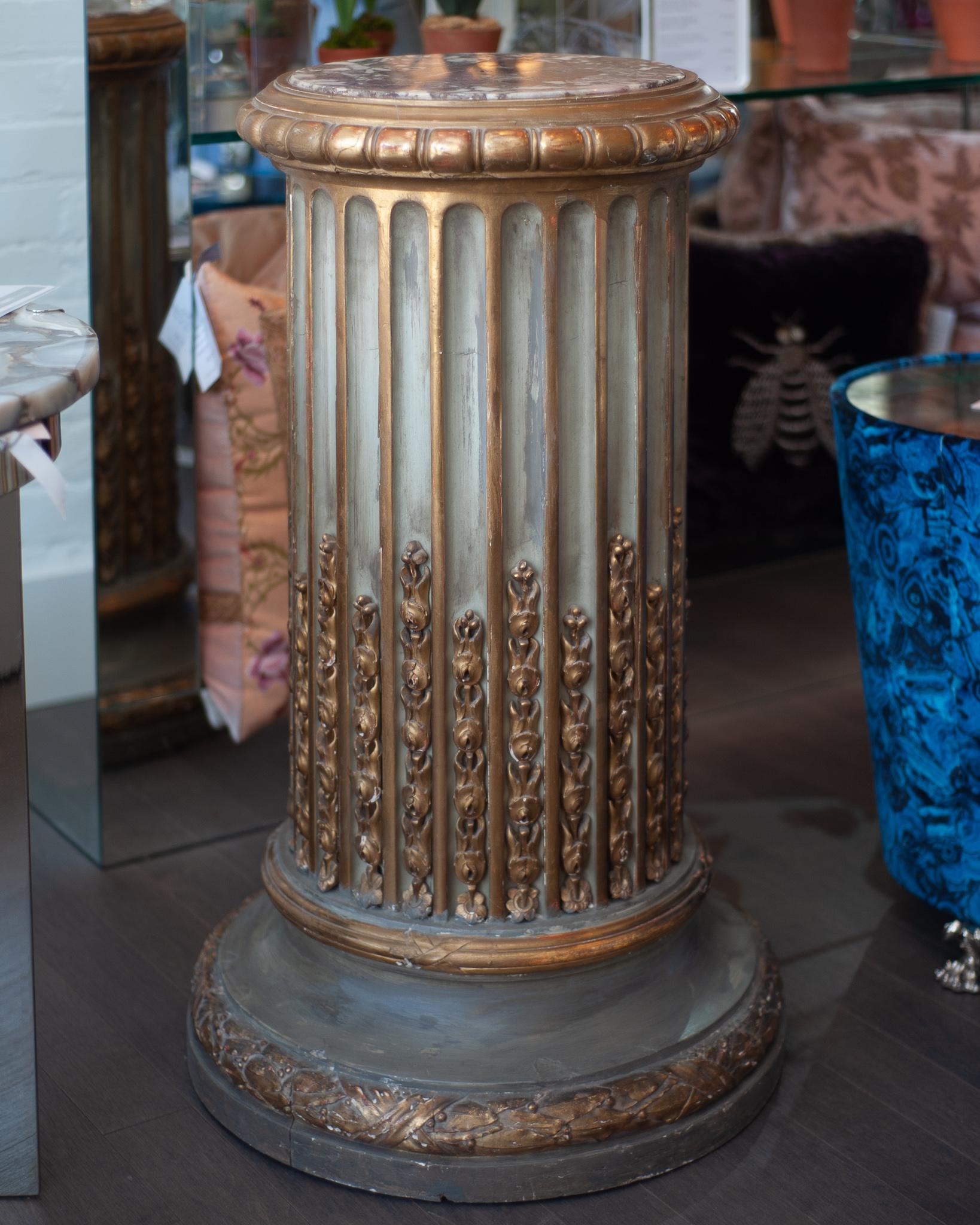 A stunning and grand antique carved Napoleon III pedestal with Breccia marble top. Ornately hand carved and gilded, this large statement piece is sure to make an impact. 12