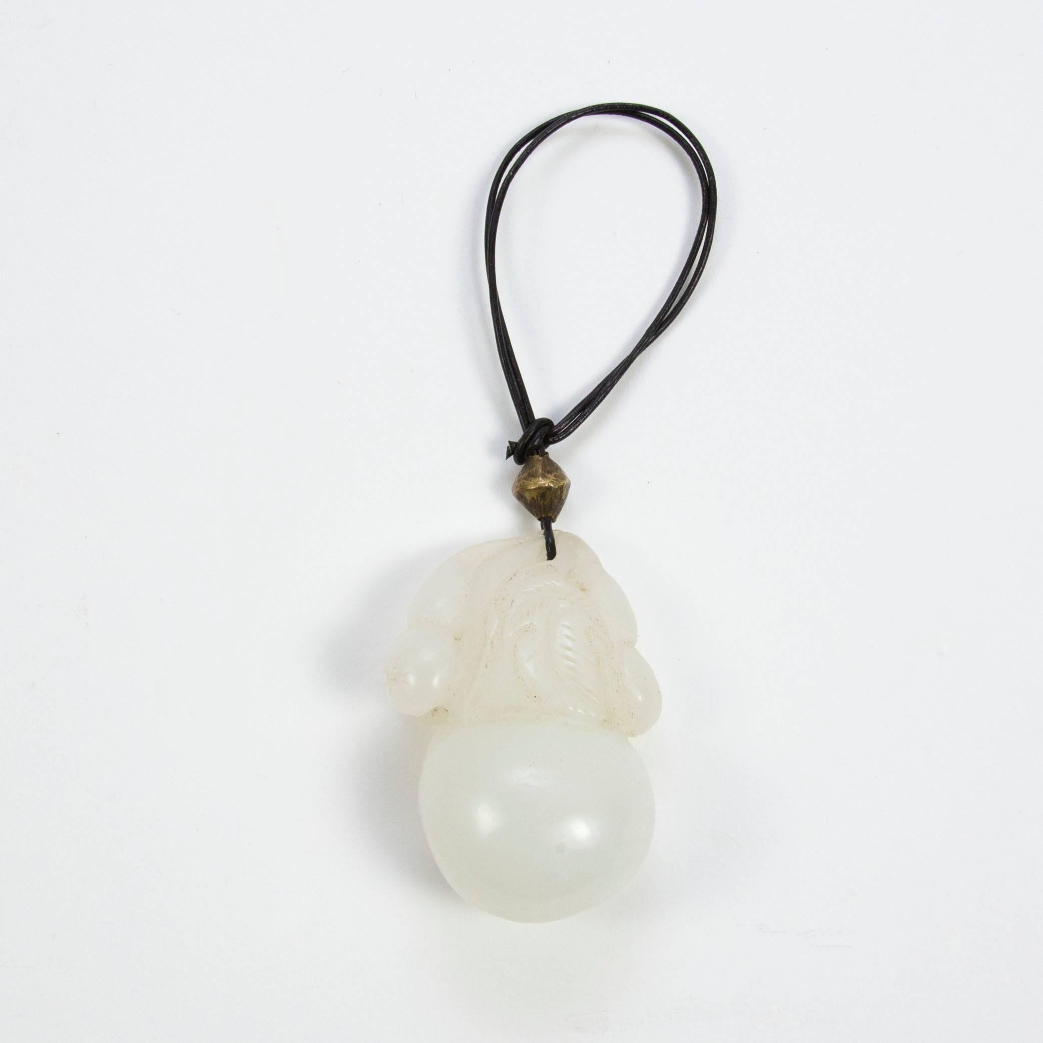 Fabulous antique Carved Natural White Jade Jadeite Calabash Pendant Necklace; measuring approx. 2.50 inches x 1.50 inches; approx. total weight 78.33 grams; Natural Jadeite is known as 'heavenly' and ‘Imperial' in the Chinese culture, believing it
