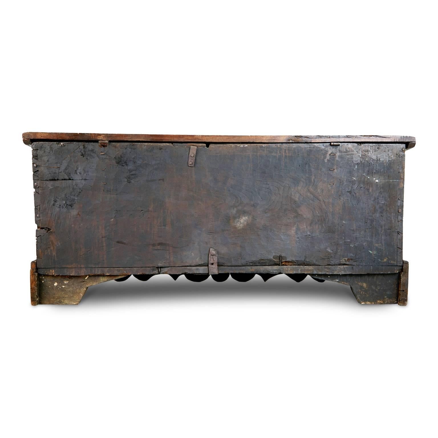 Add a real show stopper to your interior with this extremely large English Carolean chest or coffer, which can be used for blankets, bedding or other storage or display purposes. This striking piece is fabricated from hand carved oak and elm and is