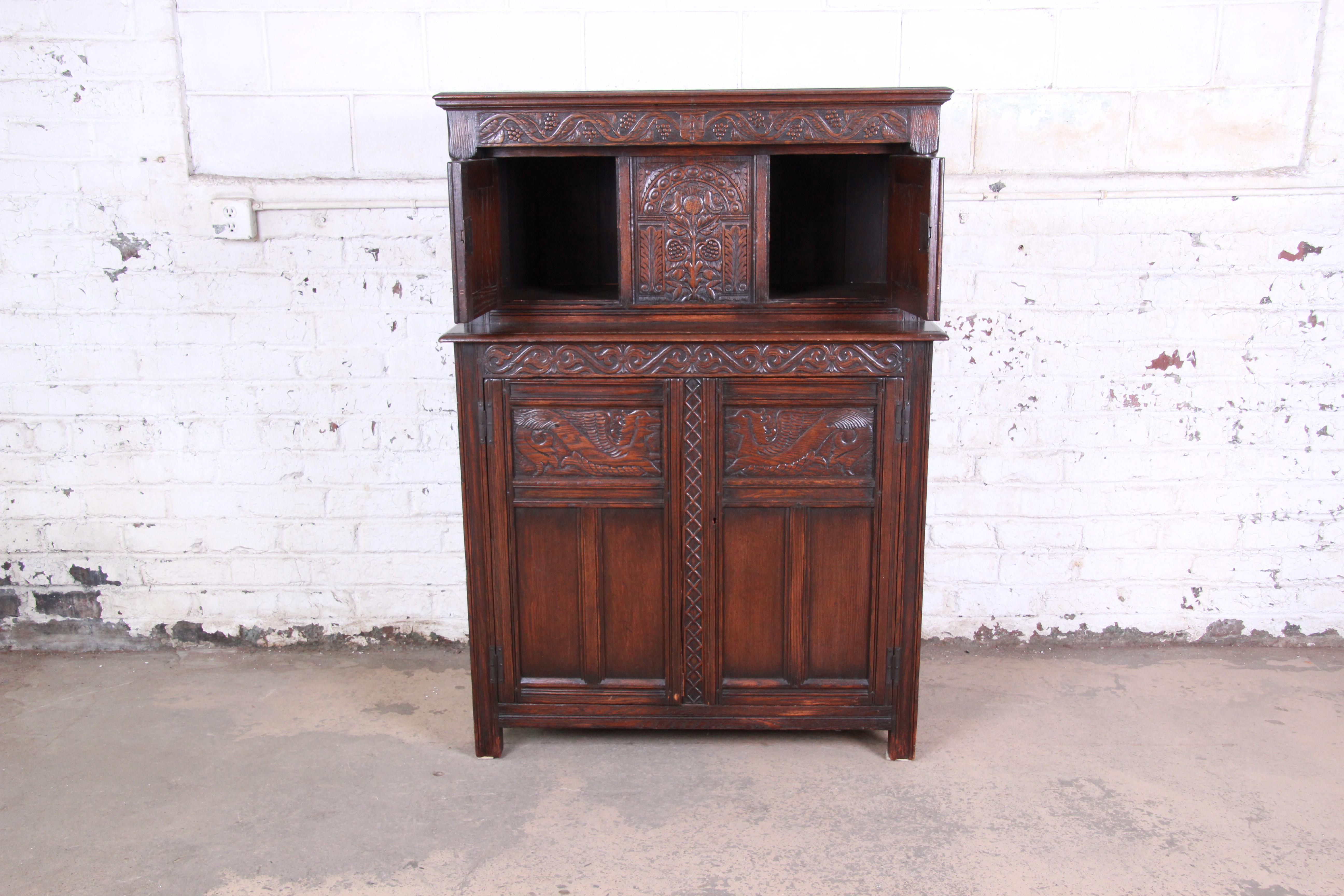 Arts and Crafts Antique Carved Oak Bar Cabinet by Kensington of New York, circa 1920s