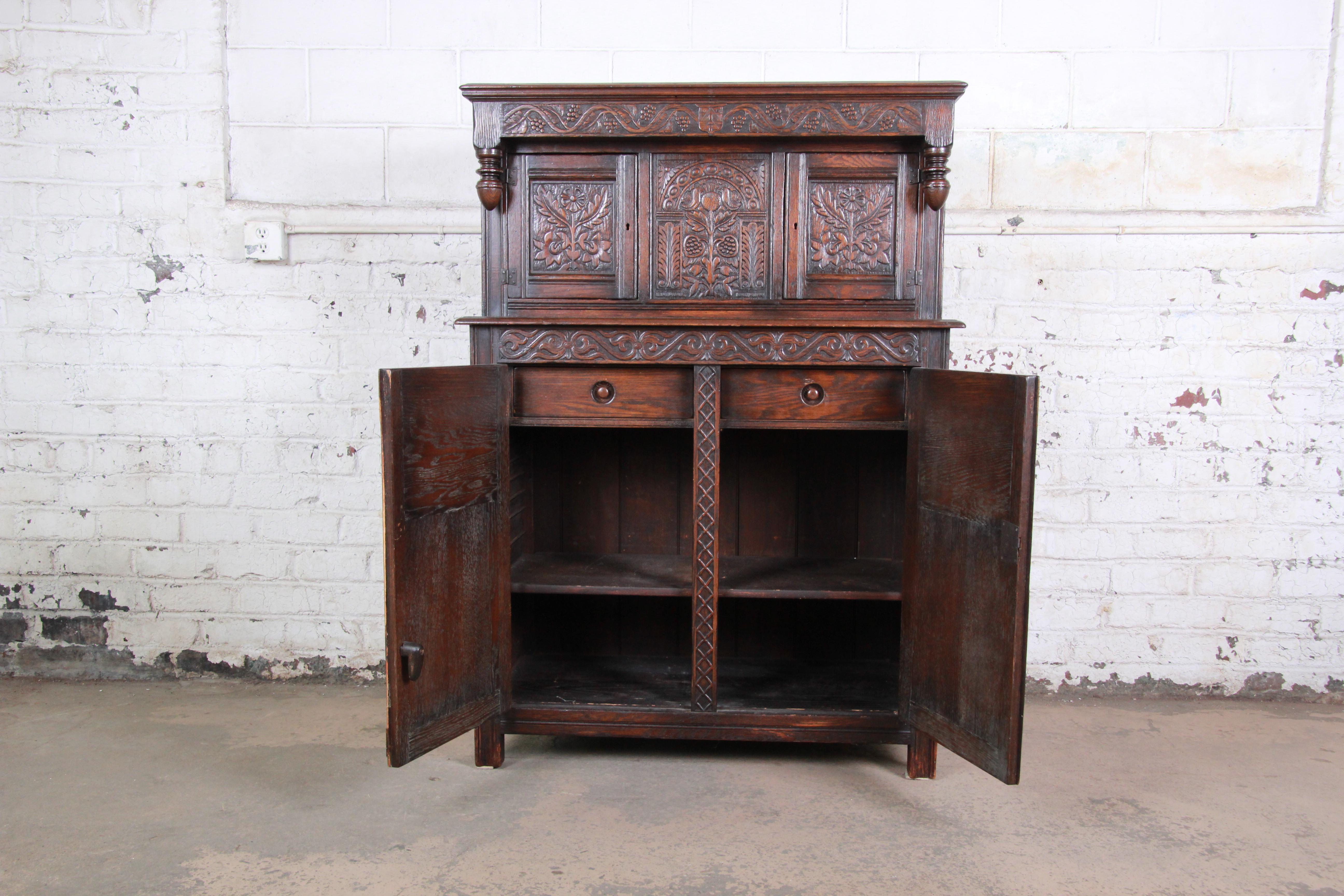 American Antique Carved Oak Bar Cabinet by Kensington of New York, circa 1920s