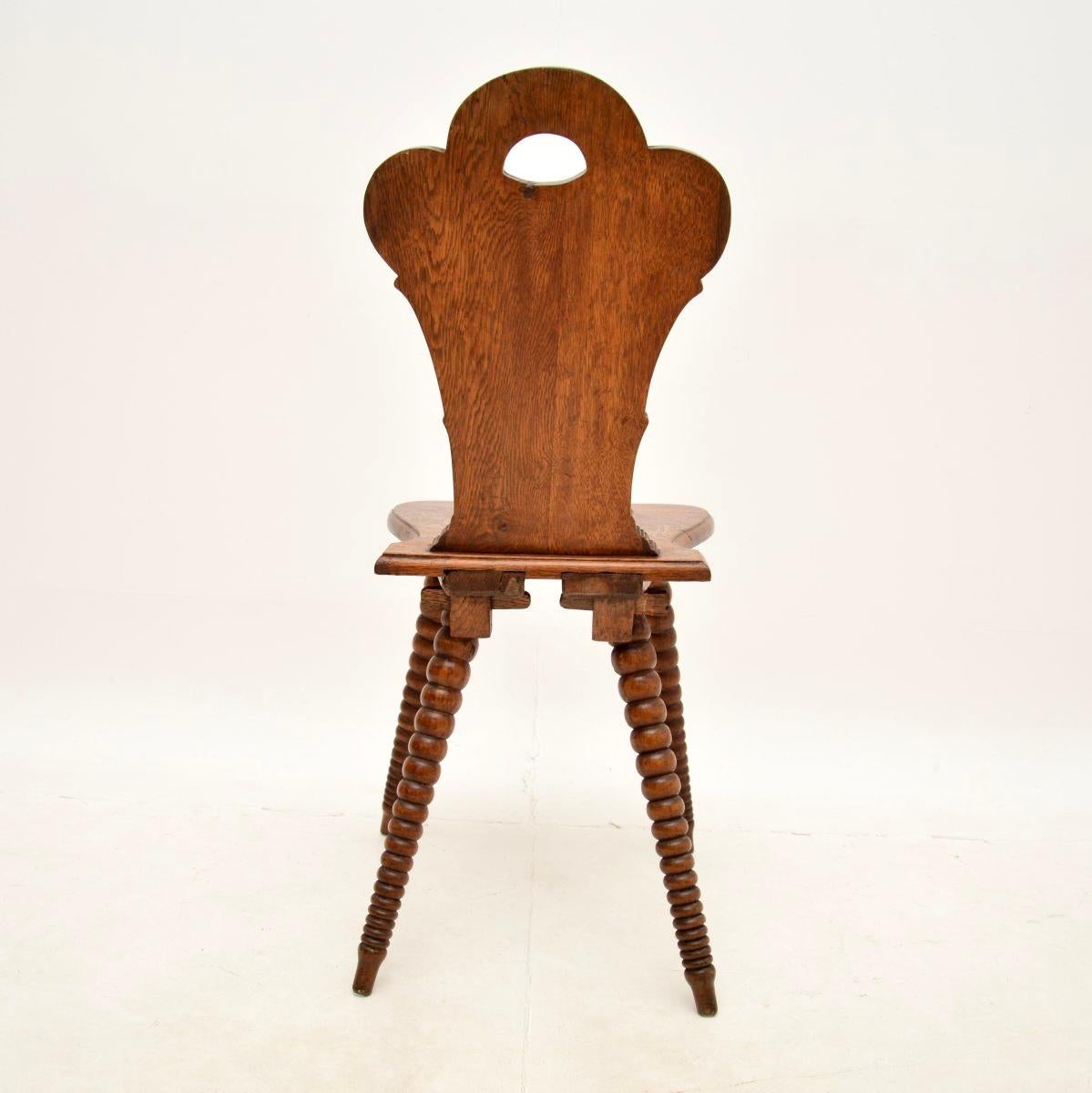 Hand-Carved Antique Carved Oak Bobbin Chair For Sale