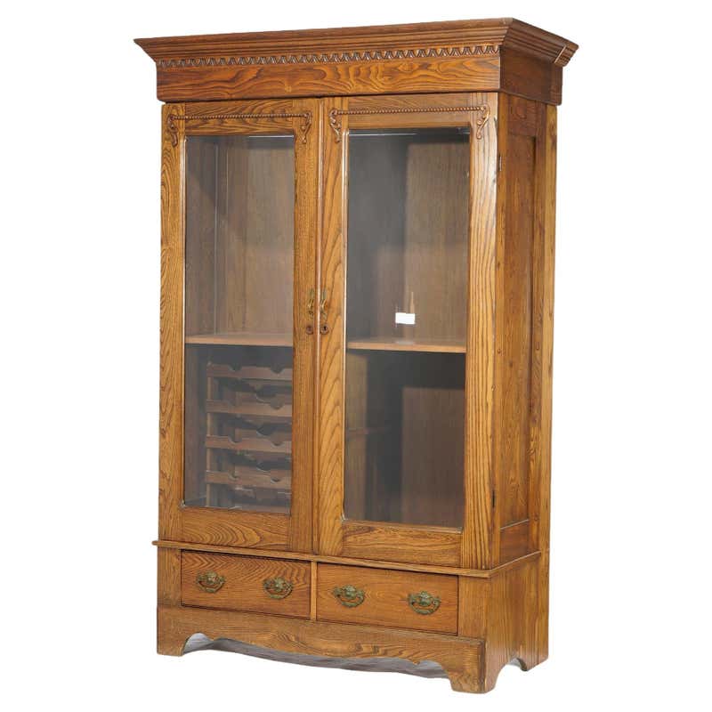 Ornately Carved Oak Bookcase With Leaded Glass Doors At 1stdibs