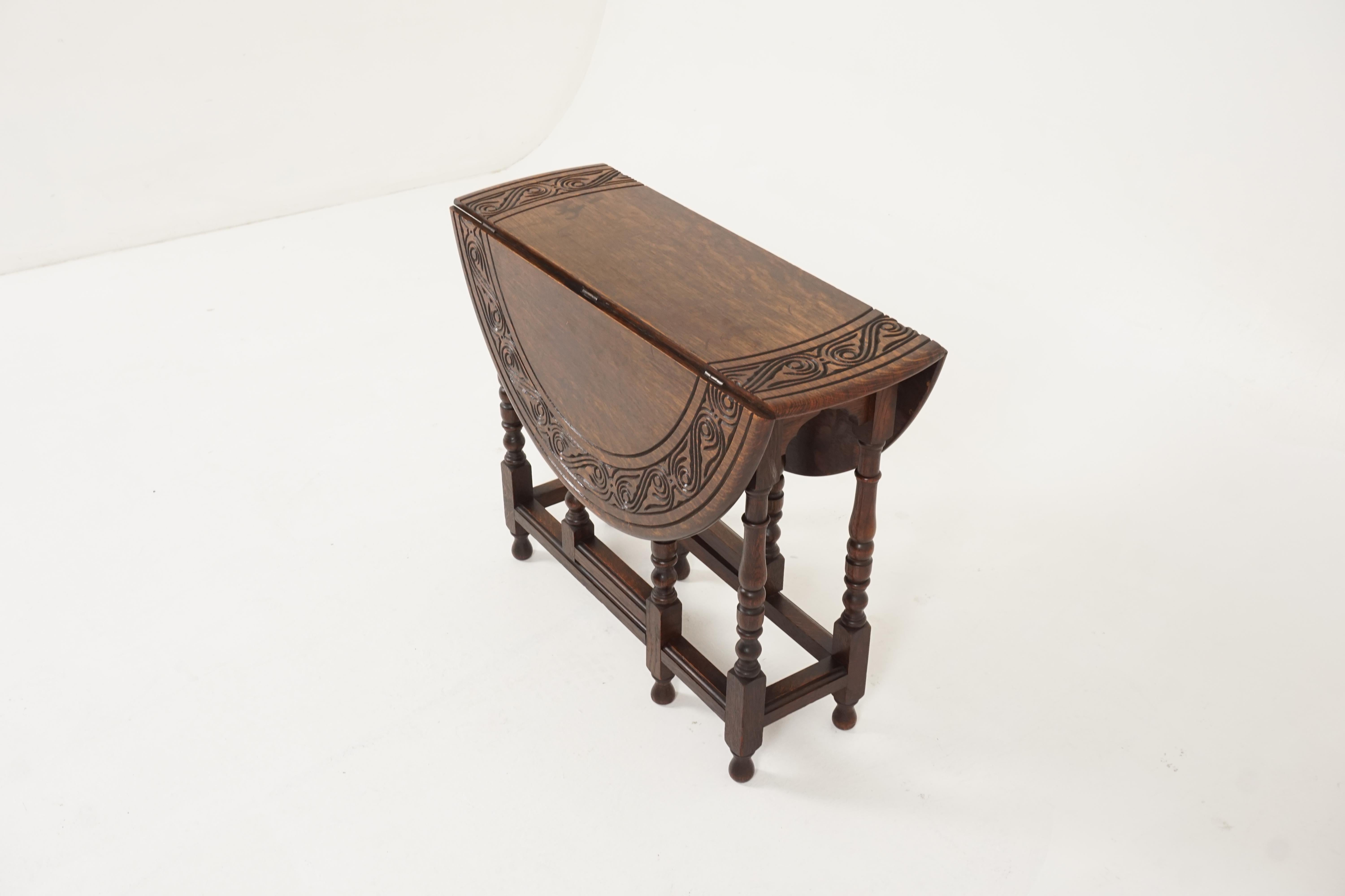 Antique carved oak drop-leaf, gateleg table, Scotland, 1910

Scotland, 1910
Solid oak
Original finish
Carved rectangular top with rounded ends
Pair of carved leaves
All standing on six turned legs
Connected by stretchers
Nice quality
Good