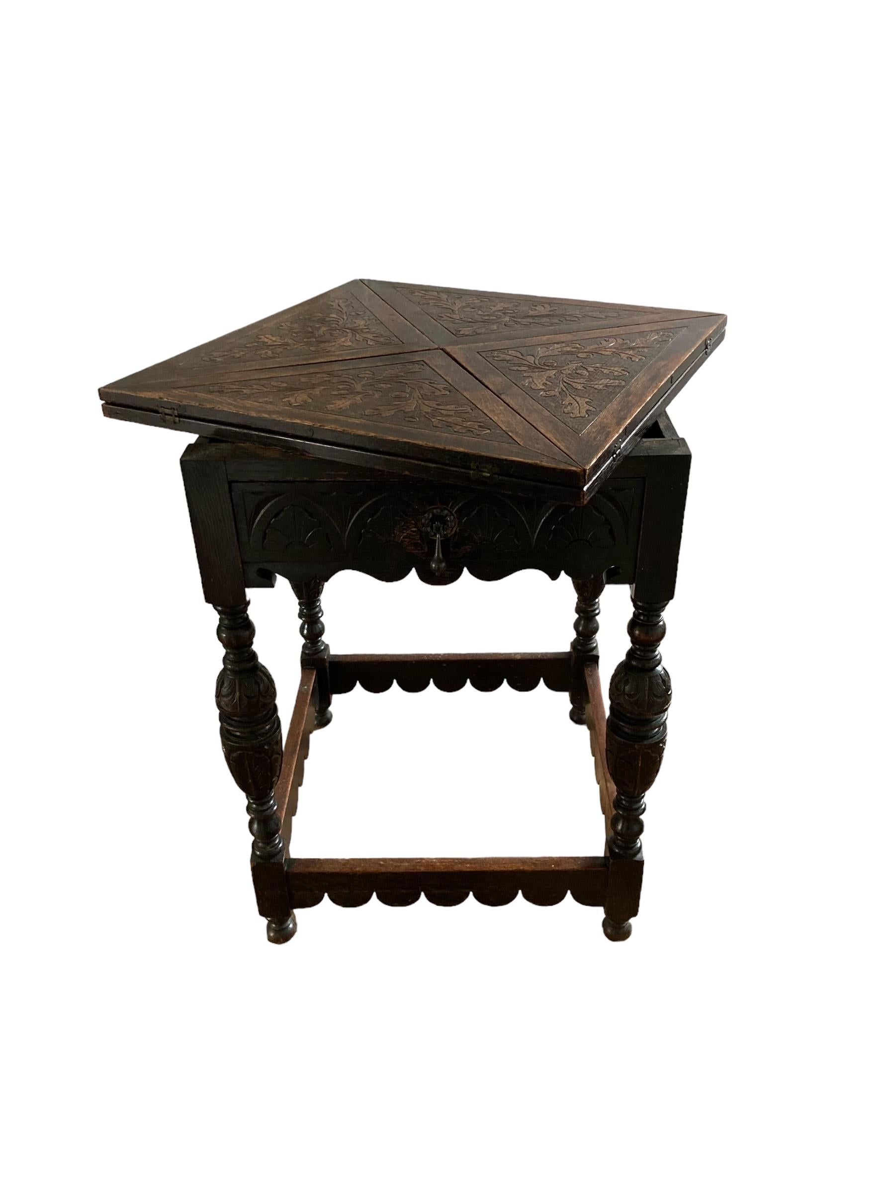 Antique Carved Oak Envelope card Table with Single Drawer and gaming wells. In Good Condition For Sale In Bishop's Stortford, GB