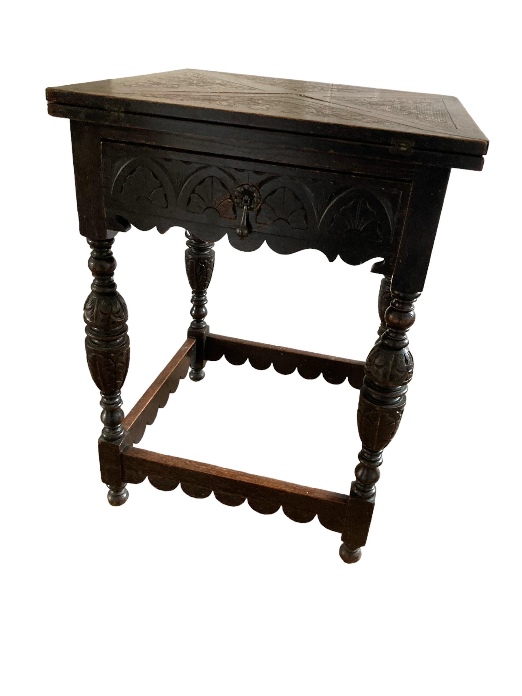 20th Century Antique Carved Oak Envelope card Table with Single Drawer and gaming wells. For Sale