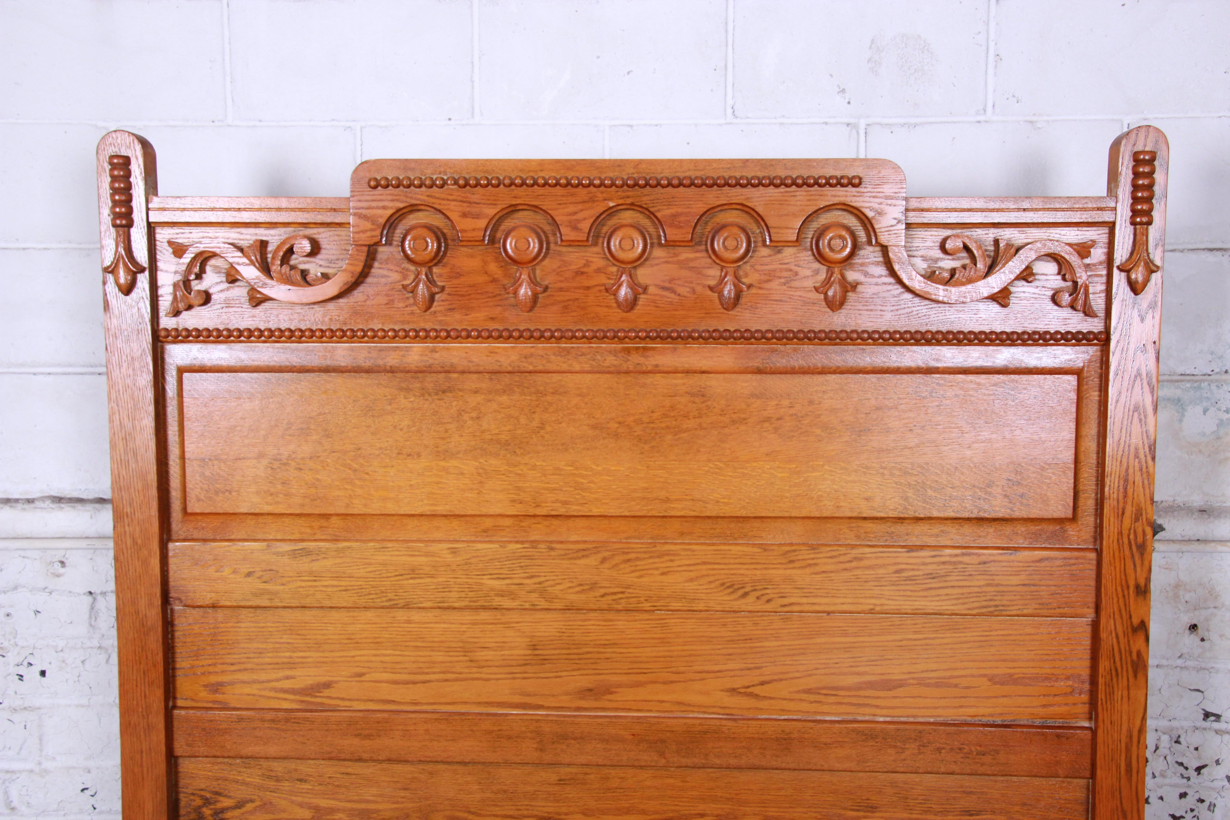 British Colonial Antique Carved Oak Full Size Bed Frame, circa 1900