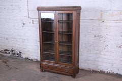 Antique Carved Oak Glass Front Locking Bookcase
