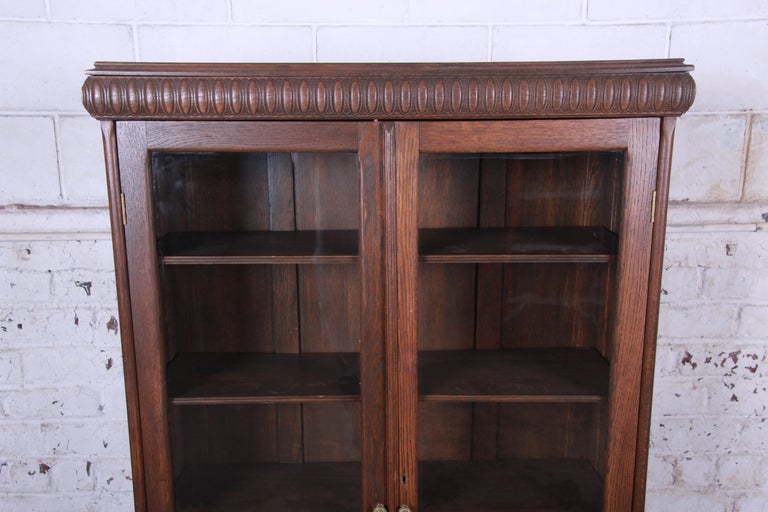 Antique Carved Oak Glass Front Locking Bookcase at 1stDibs