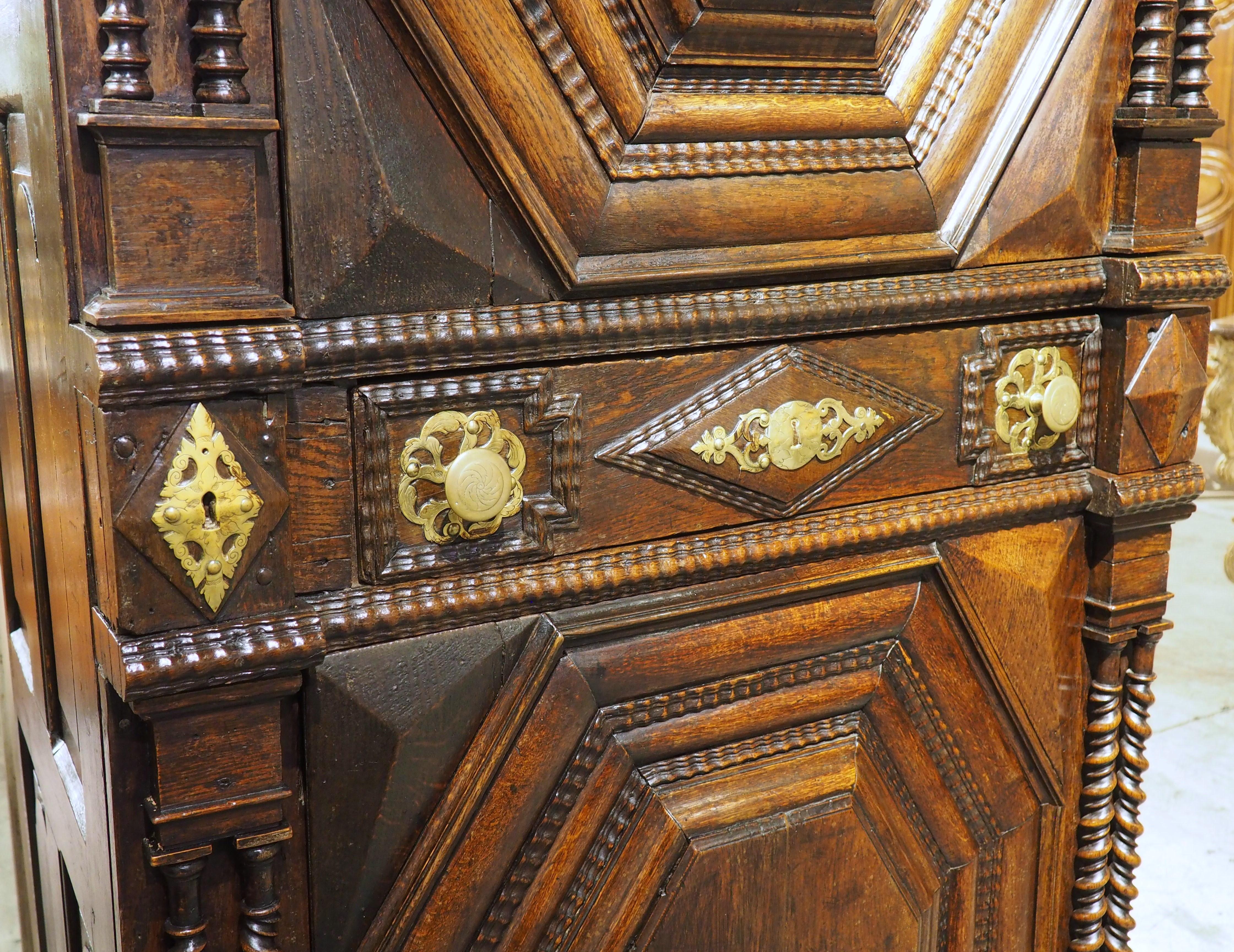 Early 18th Century Antique Carved Oak Homme Debout Malouin Cabinet from St. Malo, France, C. 1700 For Sale